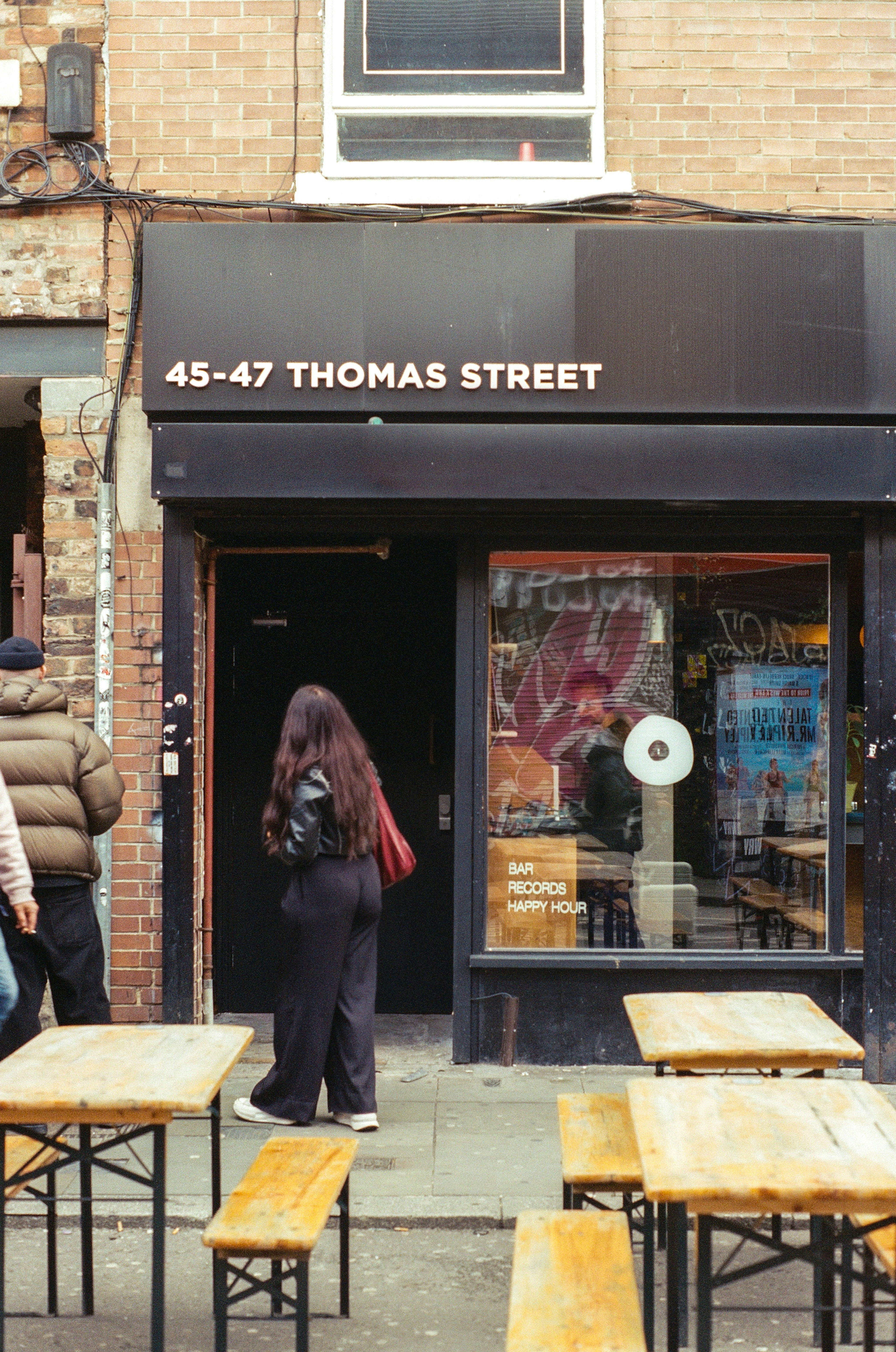 People entering a bar on thomas street