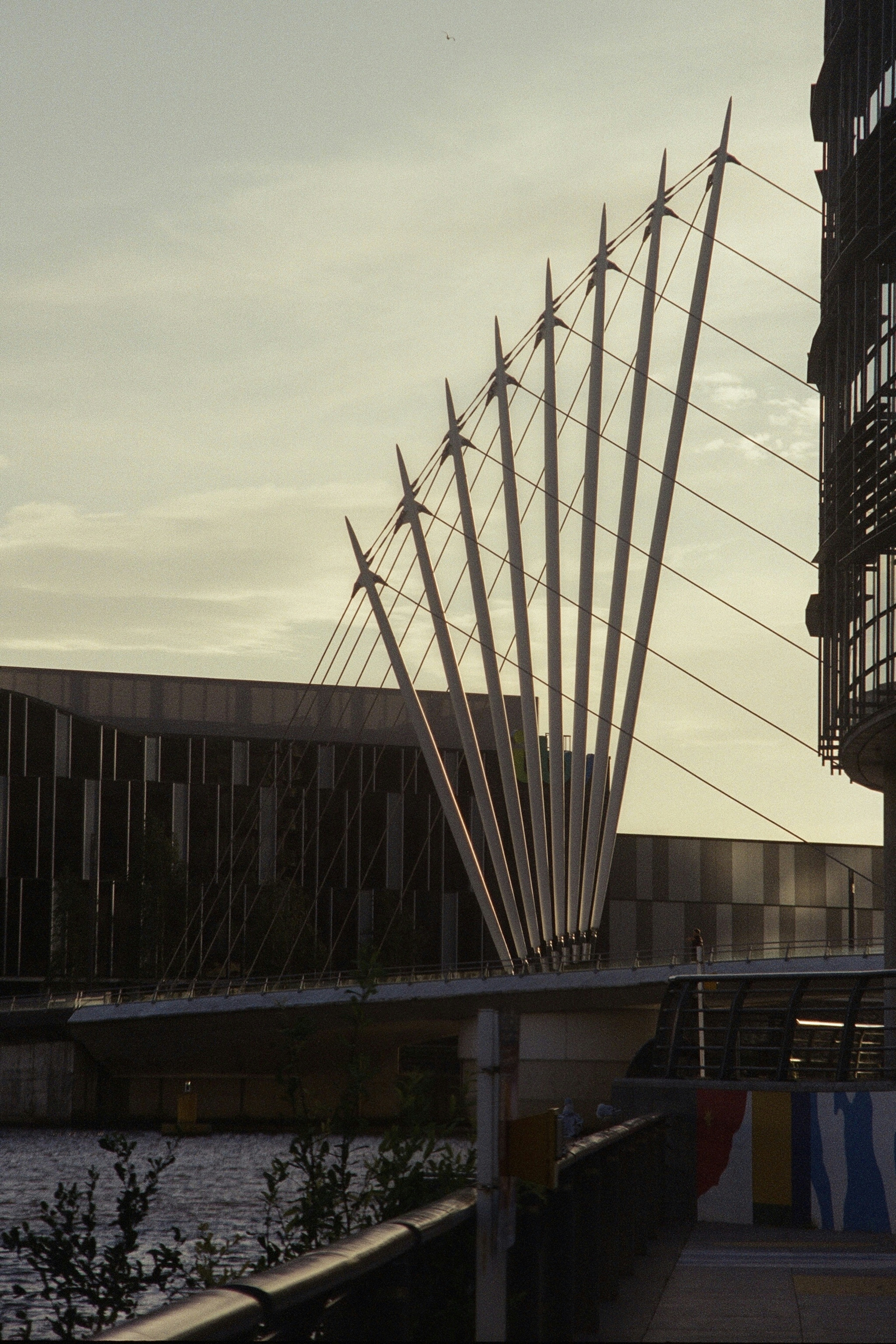 Modern bridge structure against a hazy sky