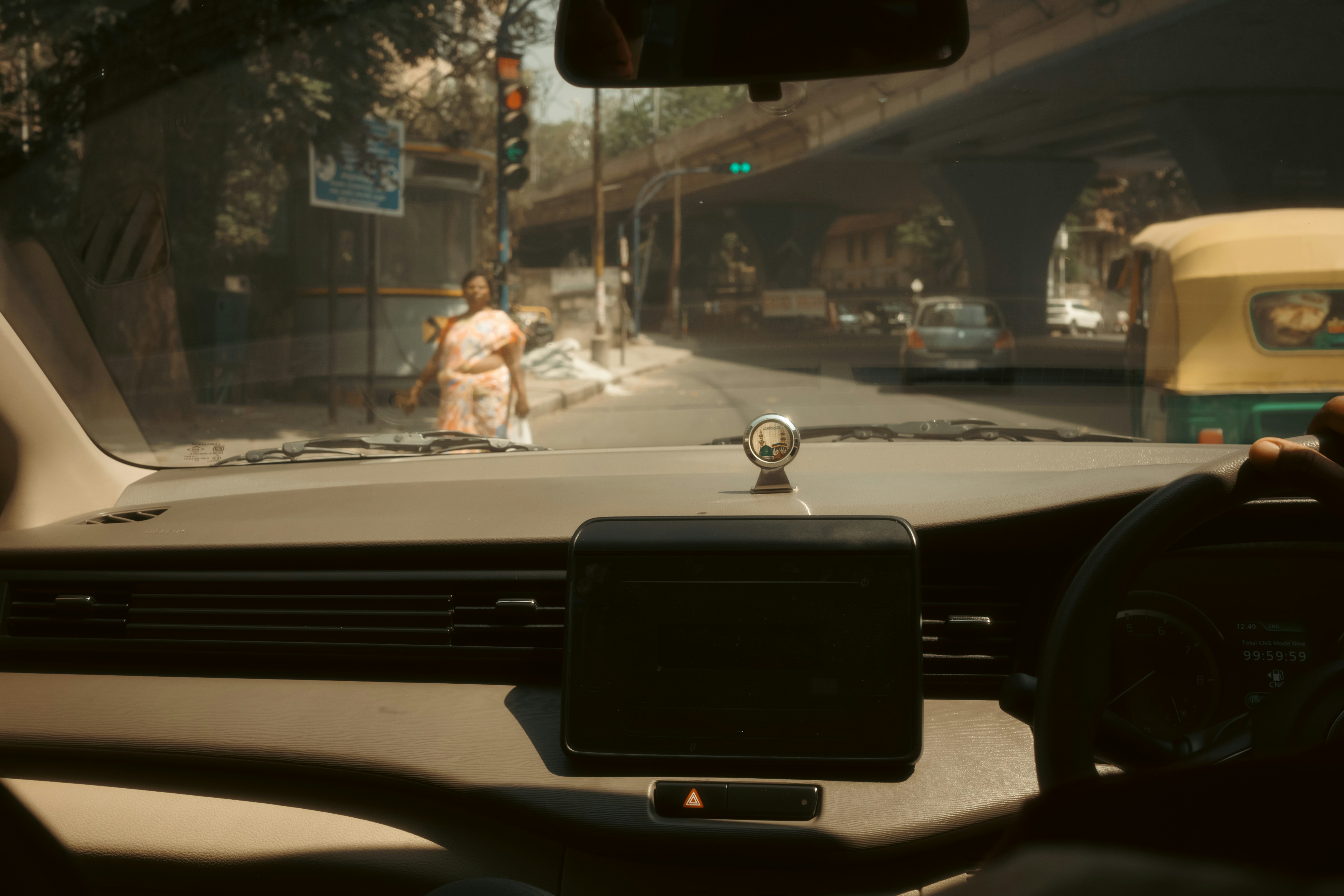 View from inside a car on a busy Indian road — advanced driving training context