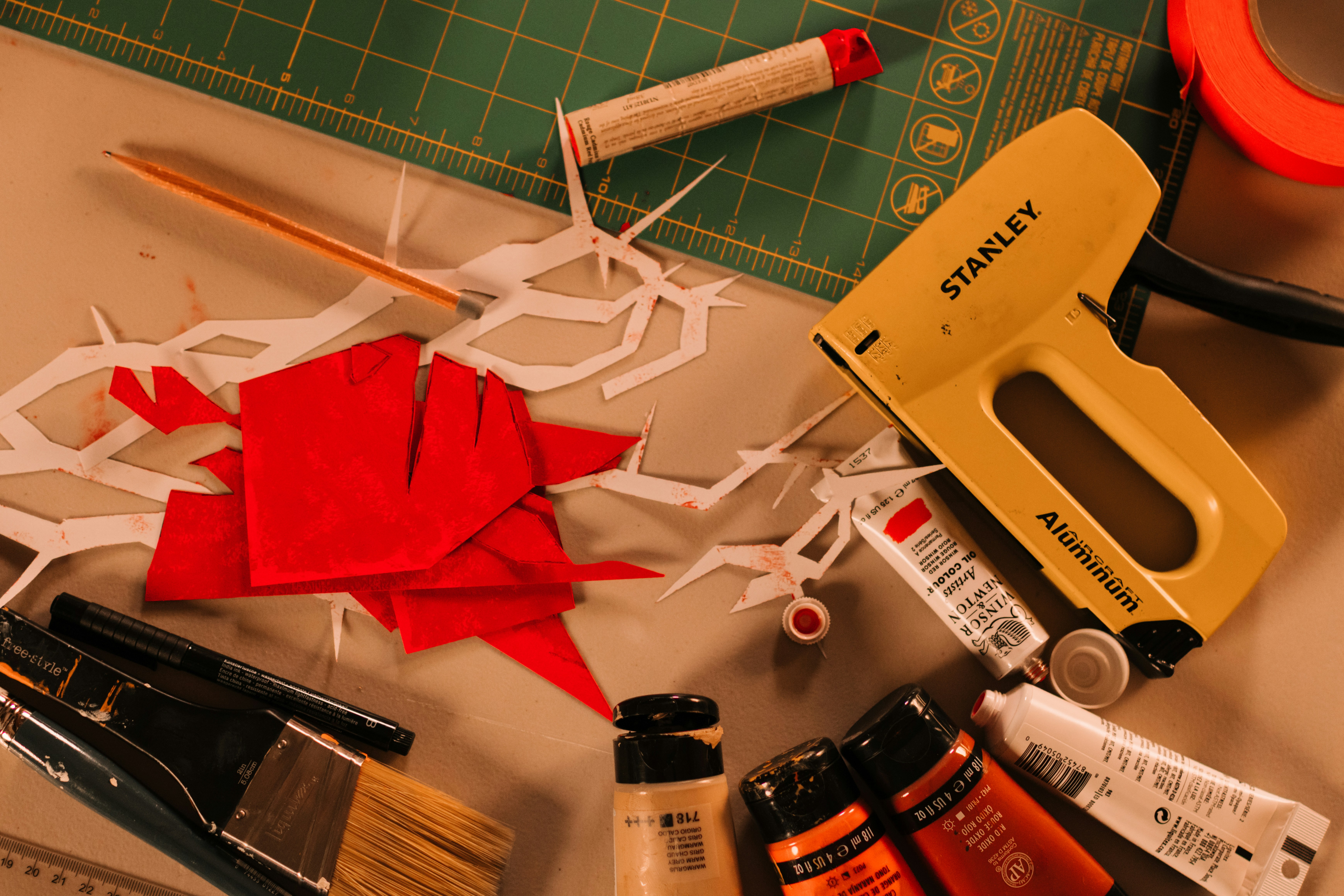 Basic craft supplies like scissors, glue, and paint for upcycling - cheap upcycling ideas