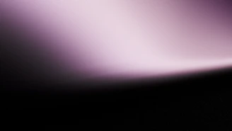 Soft gradient of purple and black background