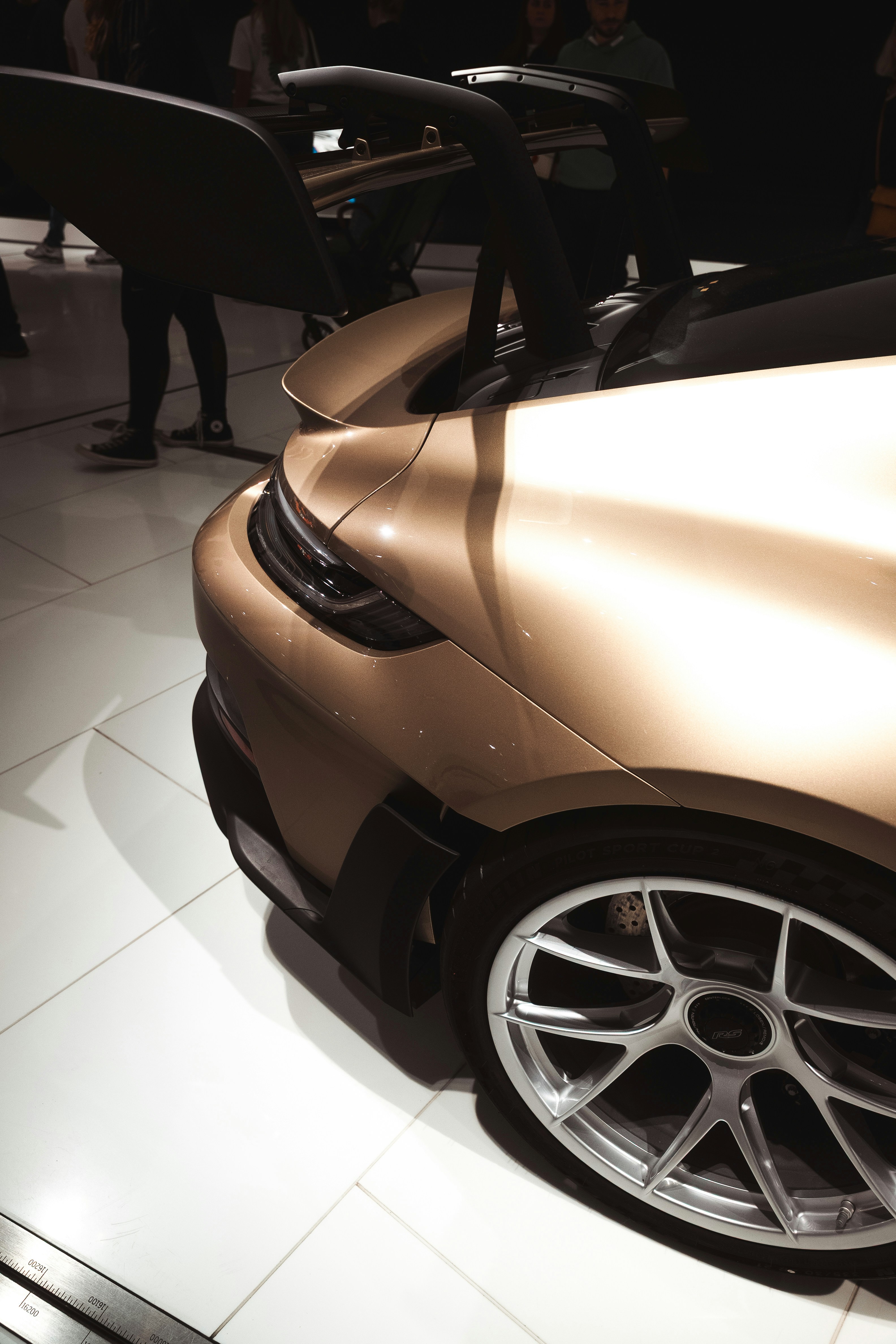 Close-up of a sleek, golden sports car