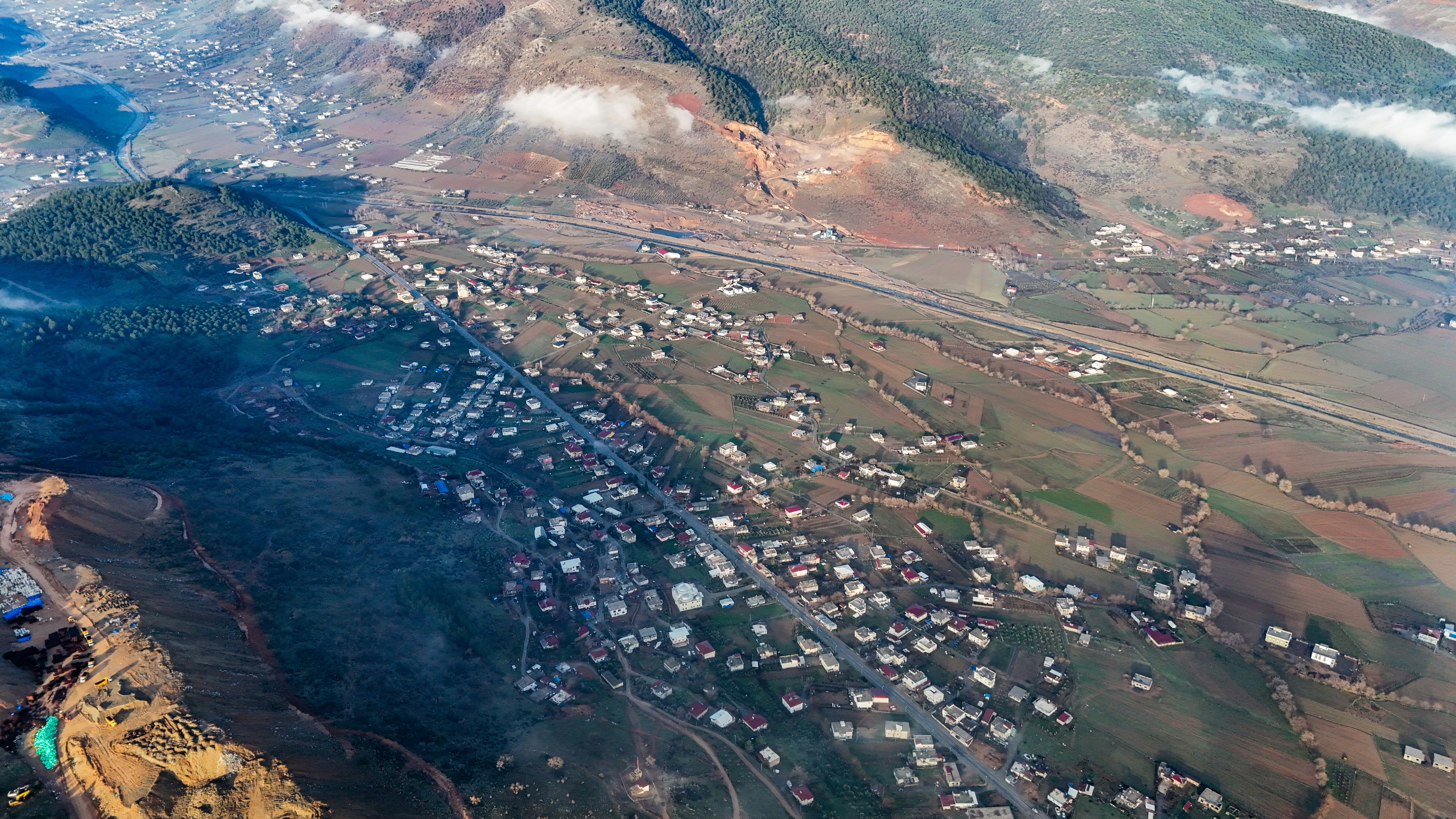Aerial view of a village nestled in a valley