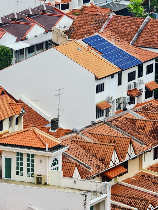 Neighborhood rooftops with solar panels