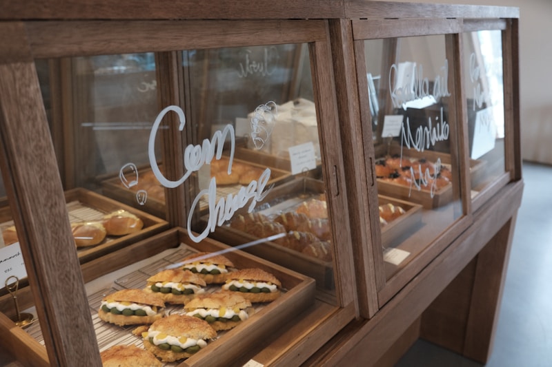 Artisan bakery display case filled with fresh bread and pastries
