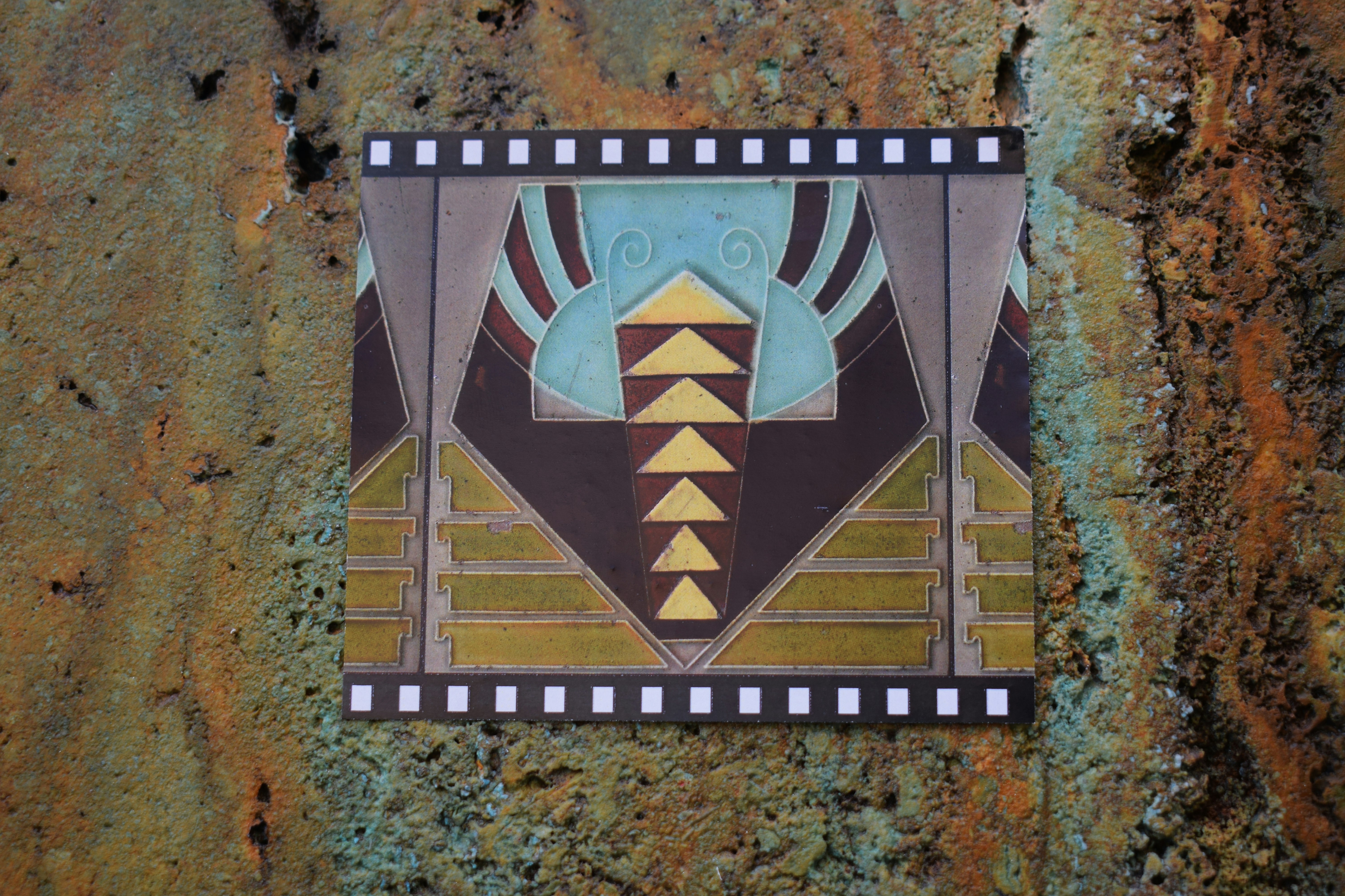 Abstract geometric art with film strip border