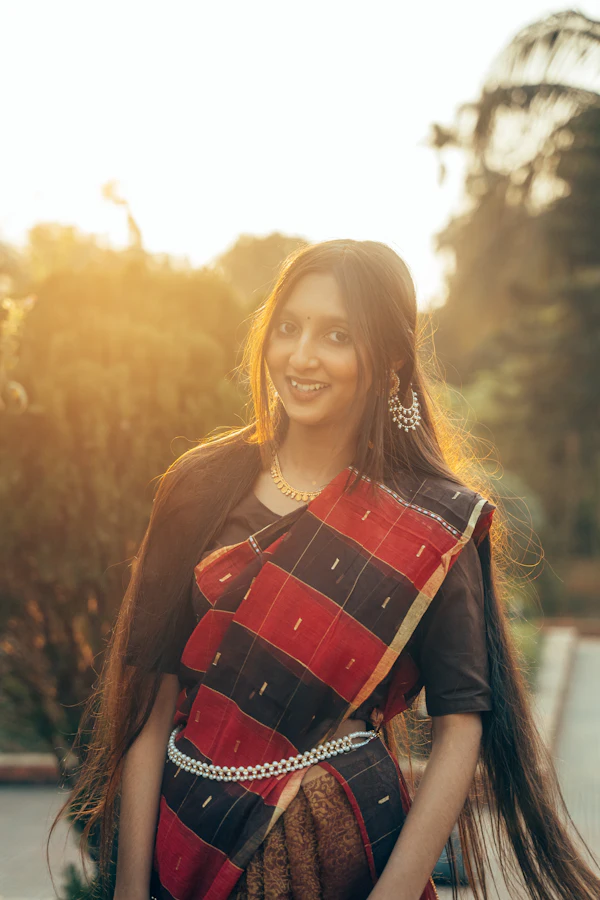 A woman smiling in warm light