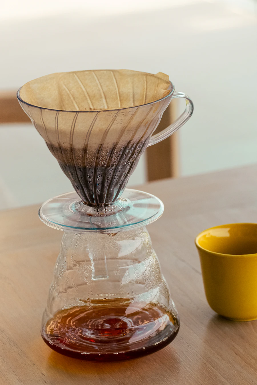 V60 dripper, glass server and yellow tasting cup