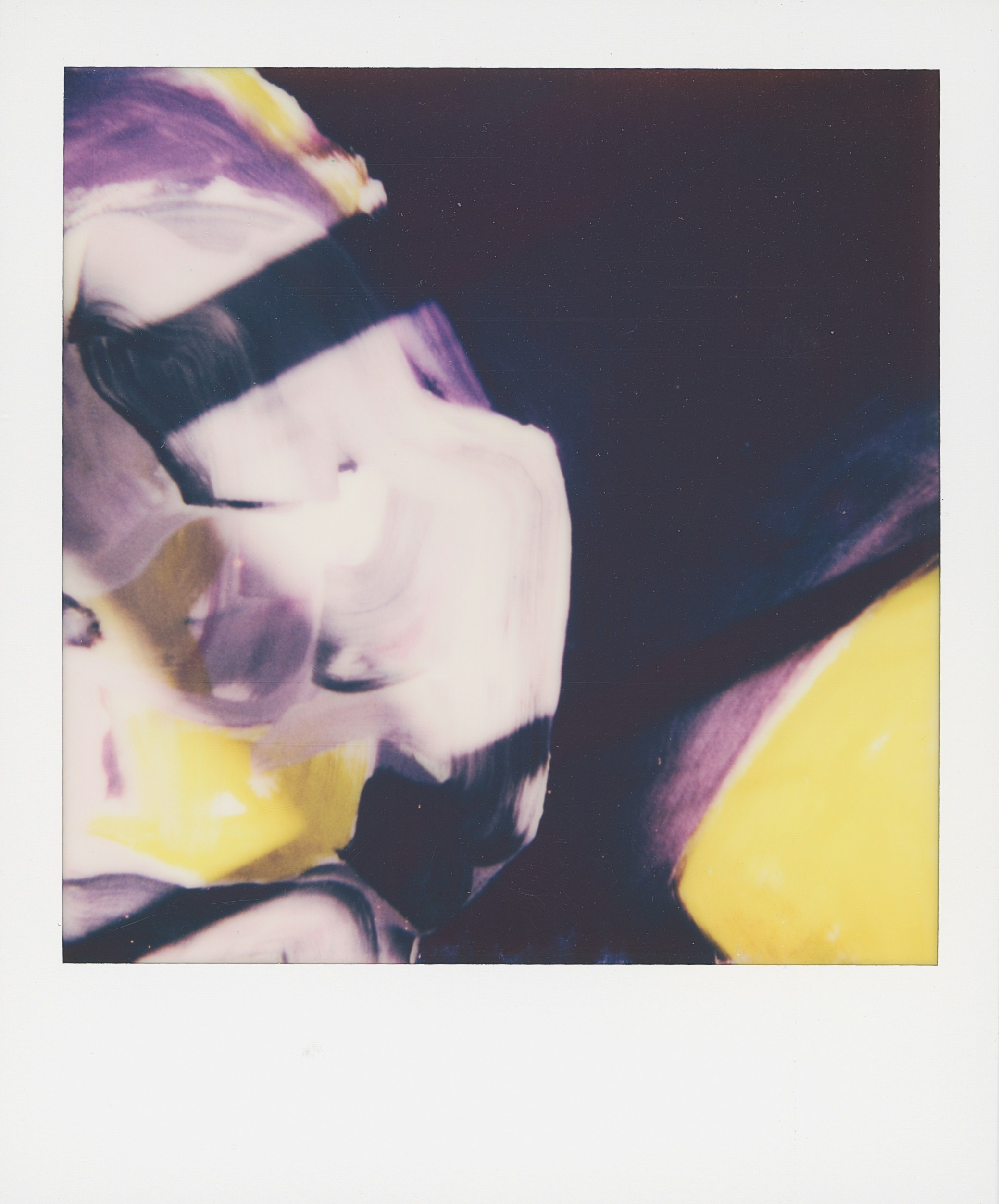 Abstract painting with purple, yellow, and white swirls.