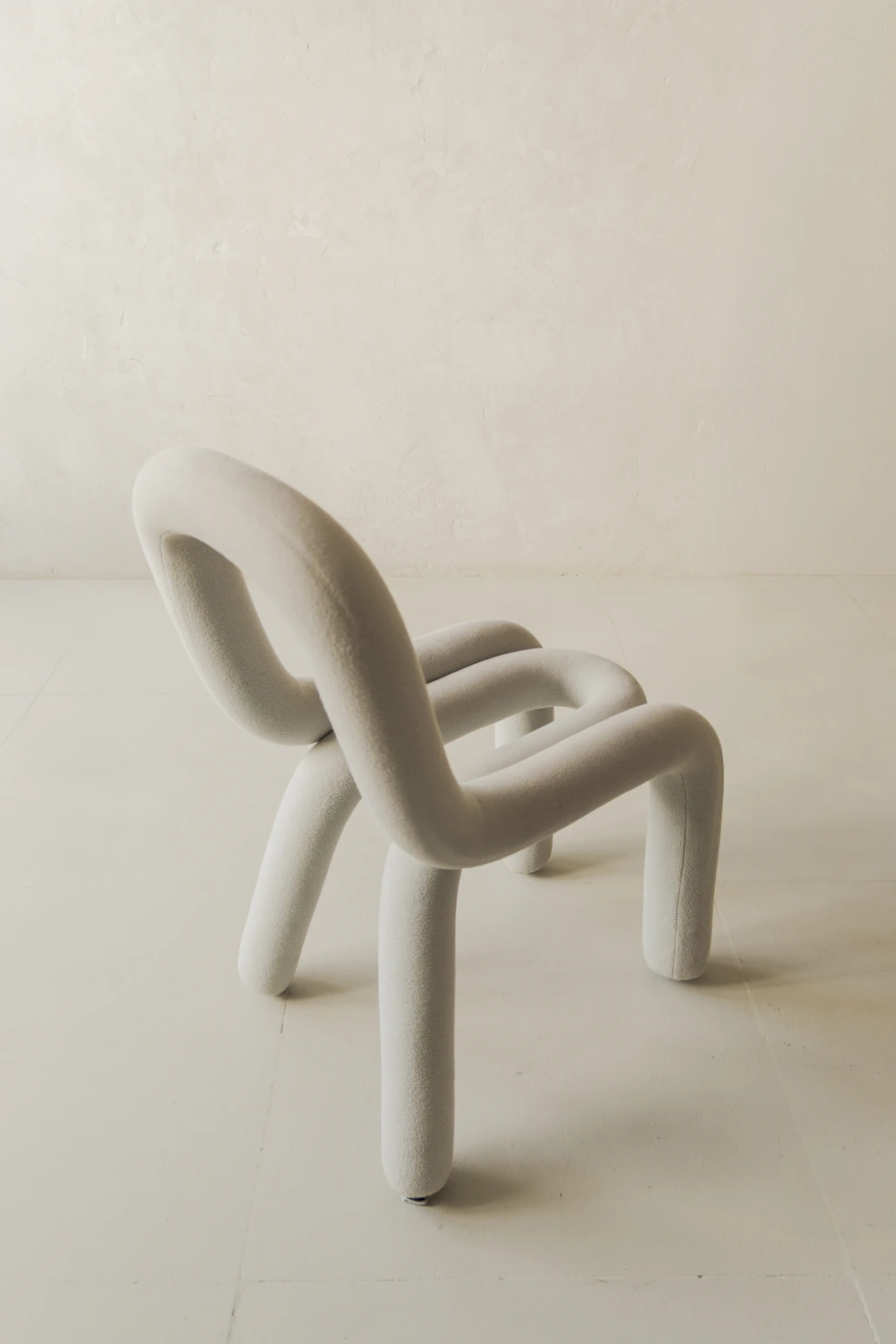 Sculptural contemporary lounge chair with rounded organic form