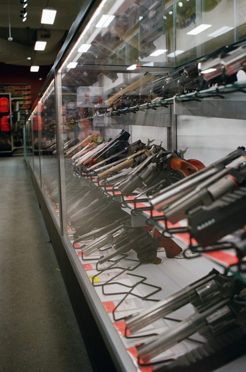 Revolvers arranged in a shop display case