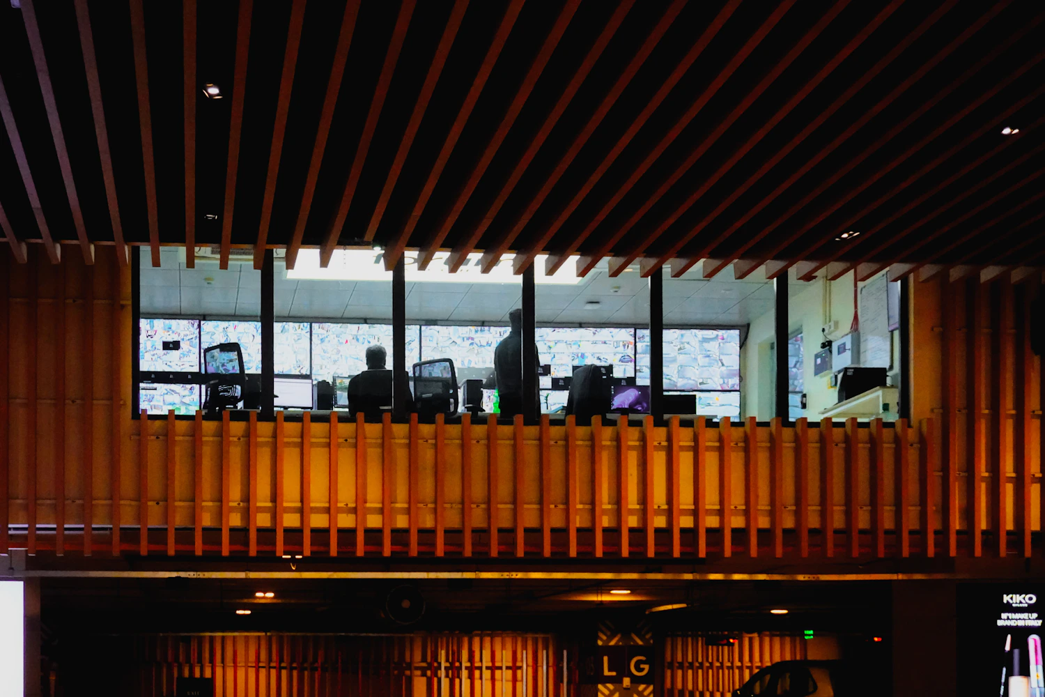 Security monitoring operators working with multiple surveillance screens