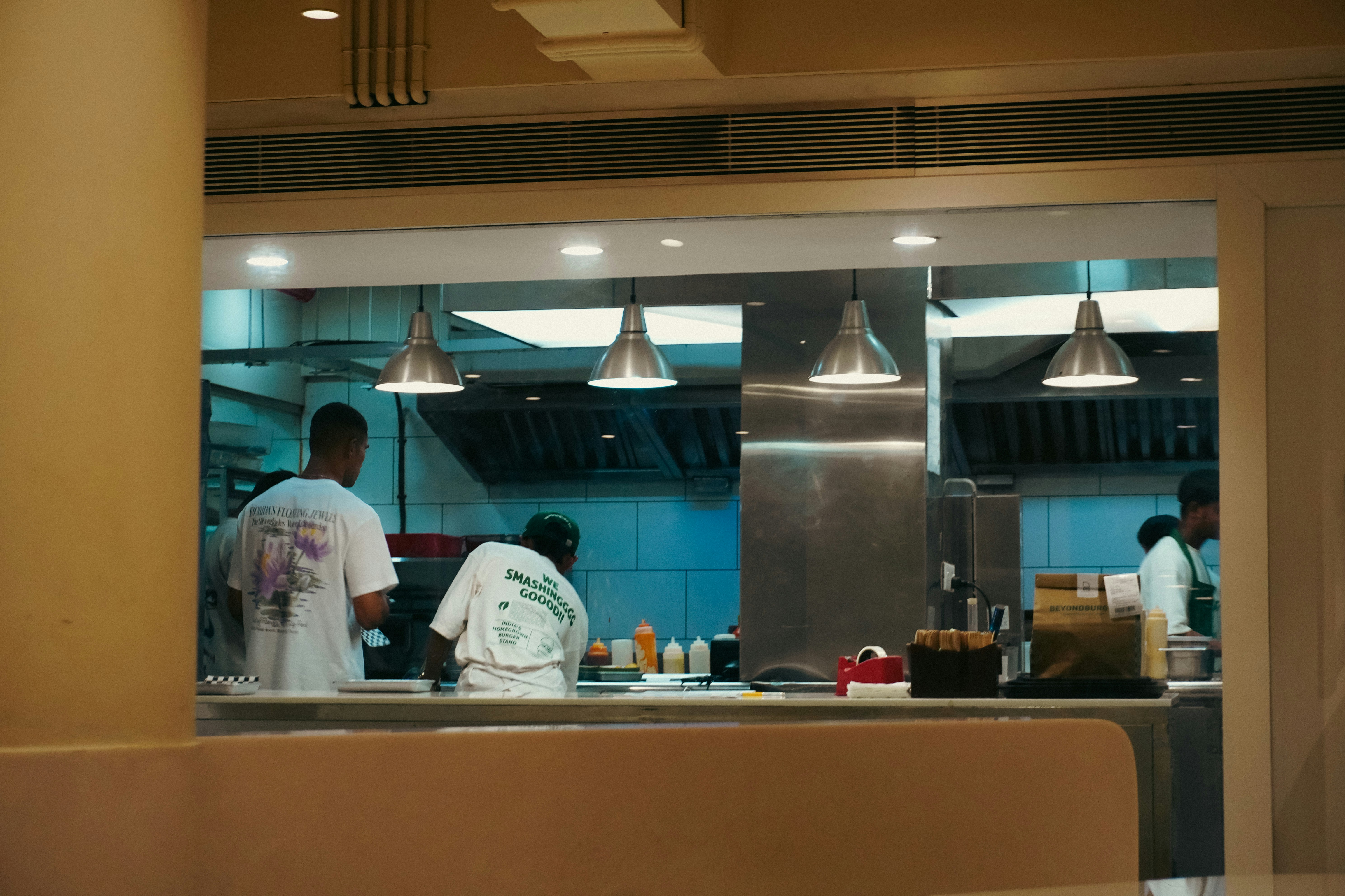 People working in a commercial kitchen