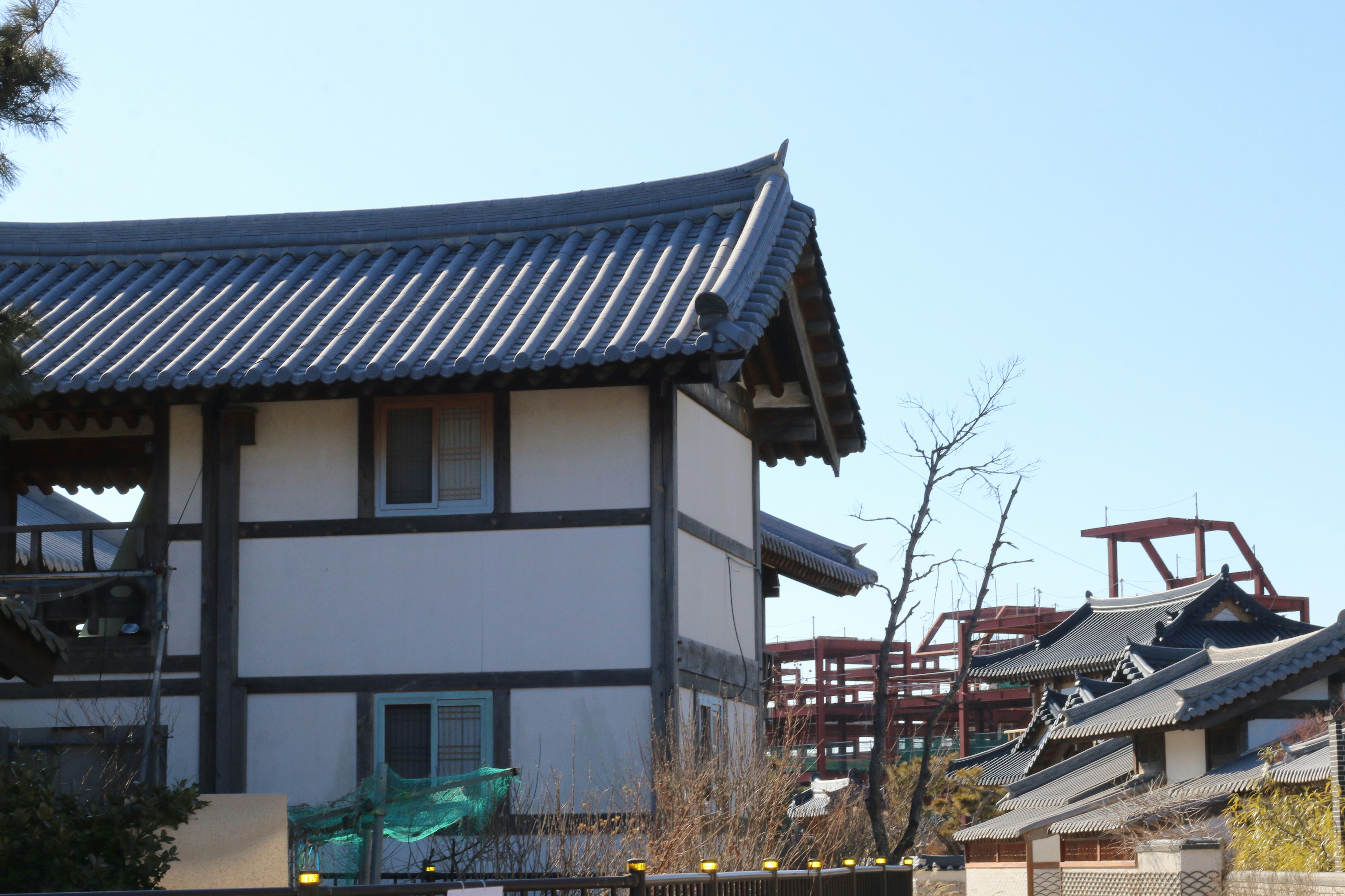 Traditional japanese buildings under a clear blue sky