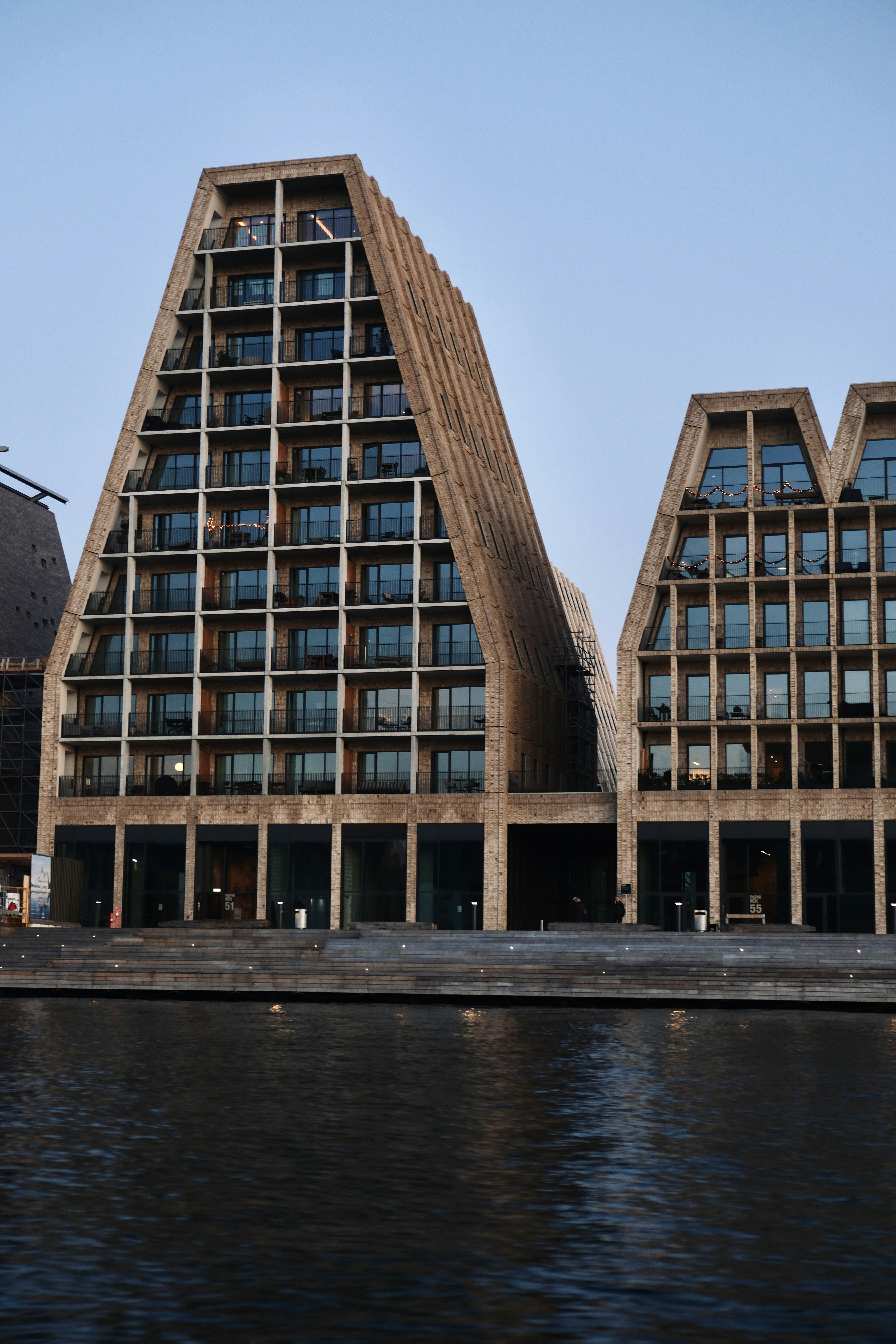Modern buildings with balconies on waterfront