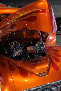 Orange hot rod car with flame paint job