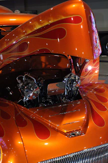 Orange hot rod car with flame paint job