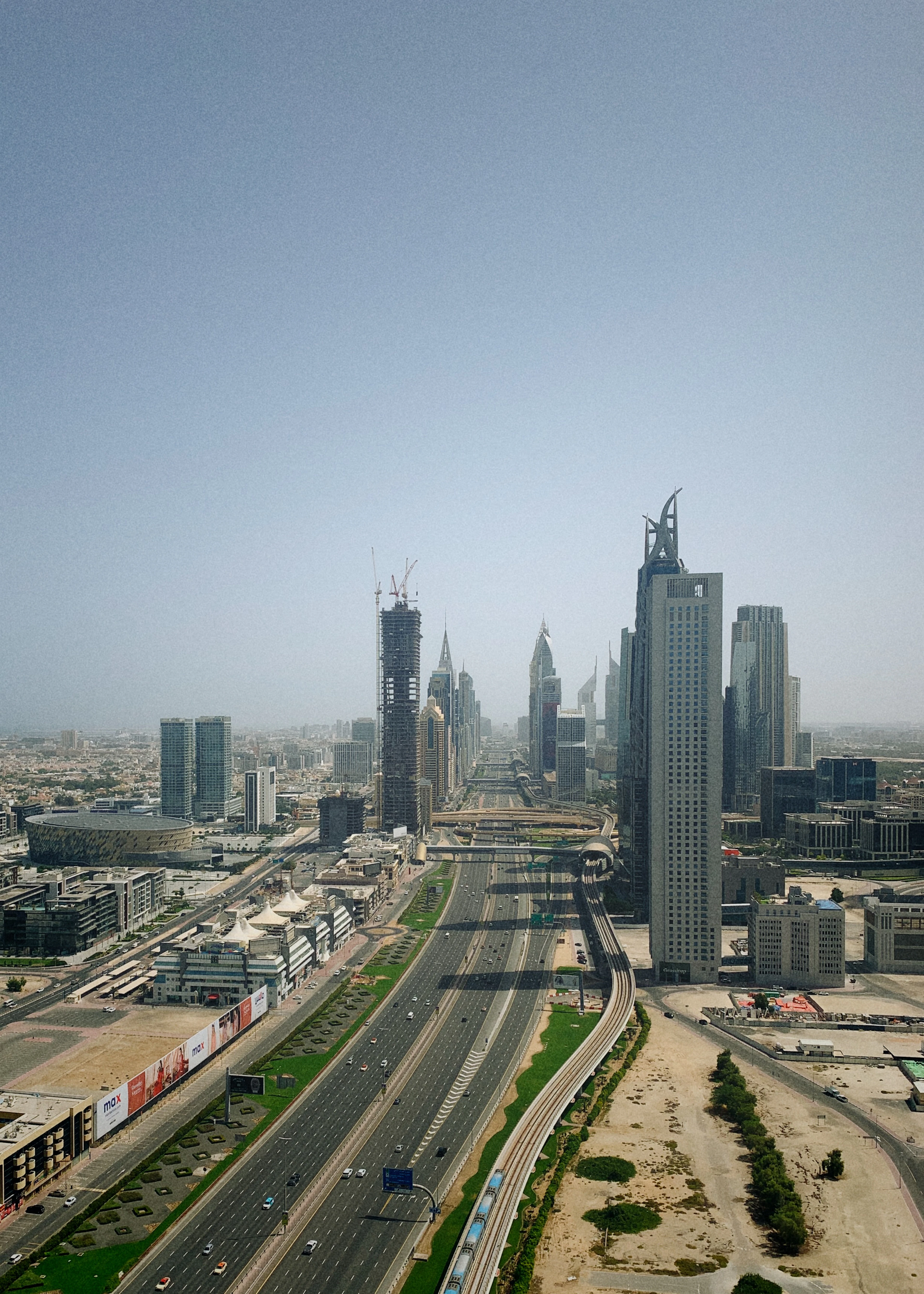 Office towers and highway in the Dubai business district