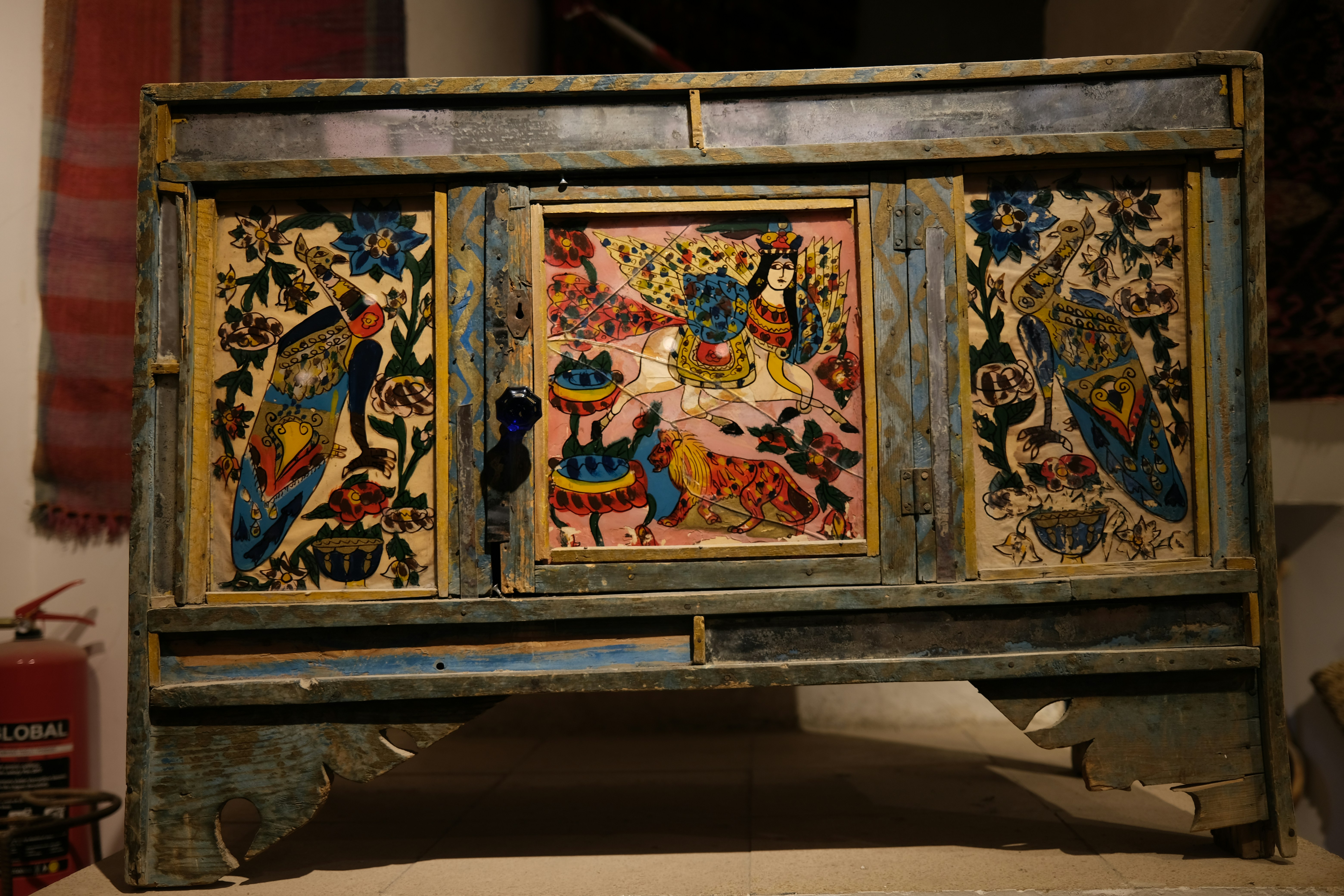 Ornate antique chest with colorful painted panels