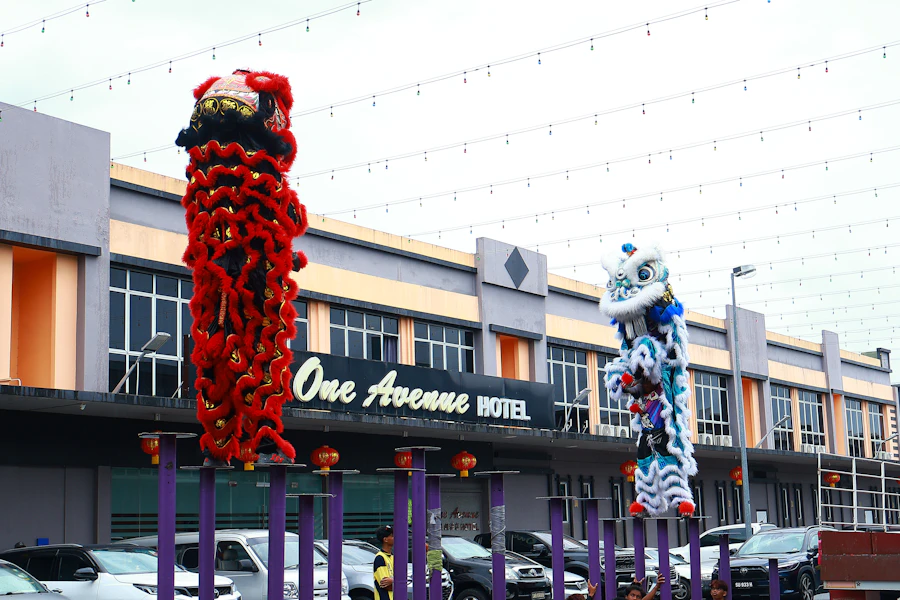Traditional Chinese lion dance performers in a colorful costume during a festival