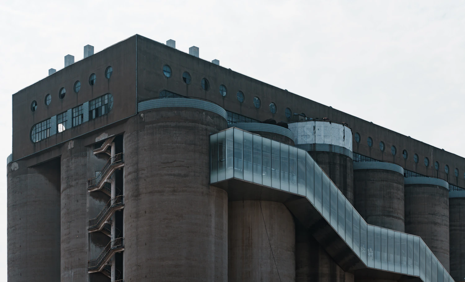 Large modern industrial silos and structural stairs