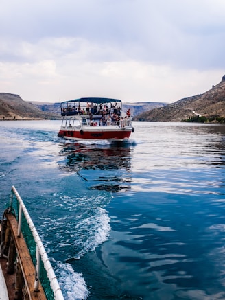 Tour boat with passengers on a wide river