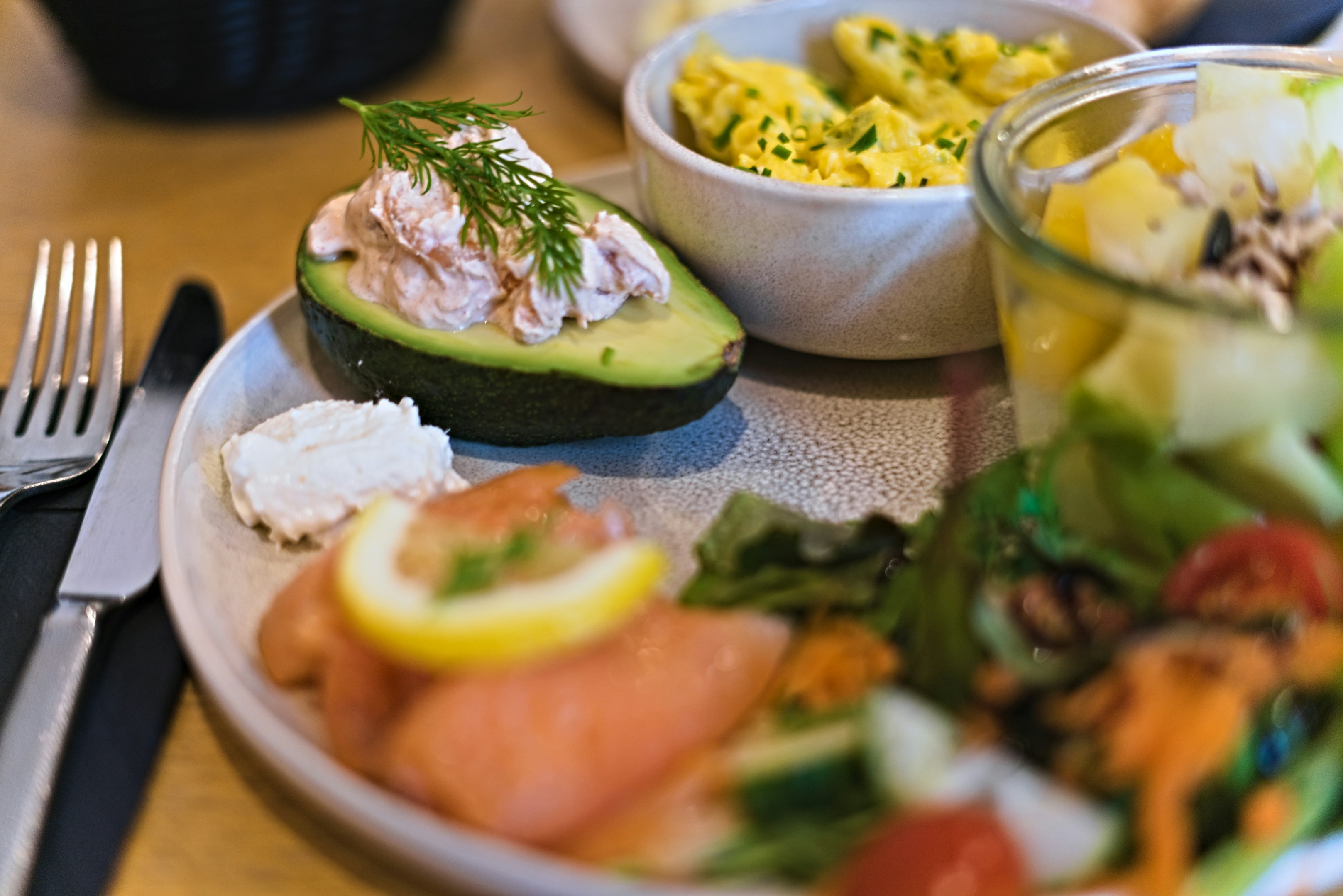 Avocado stuffed with salmon salad and dill