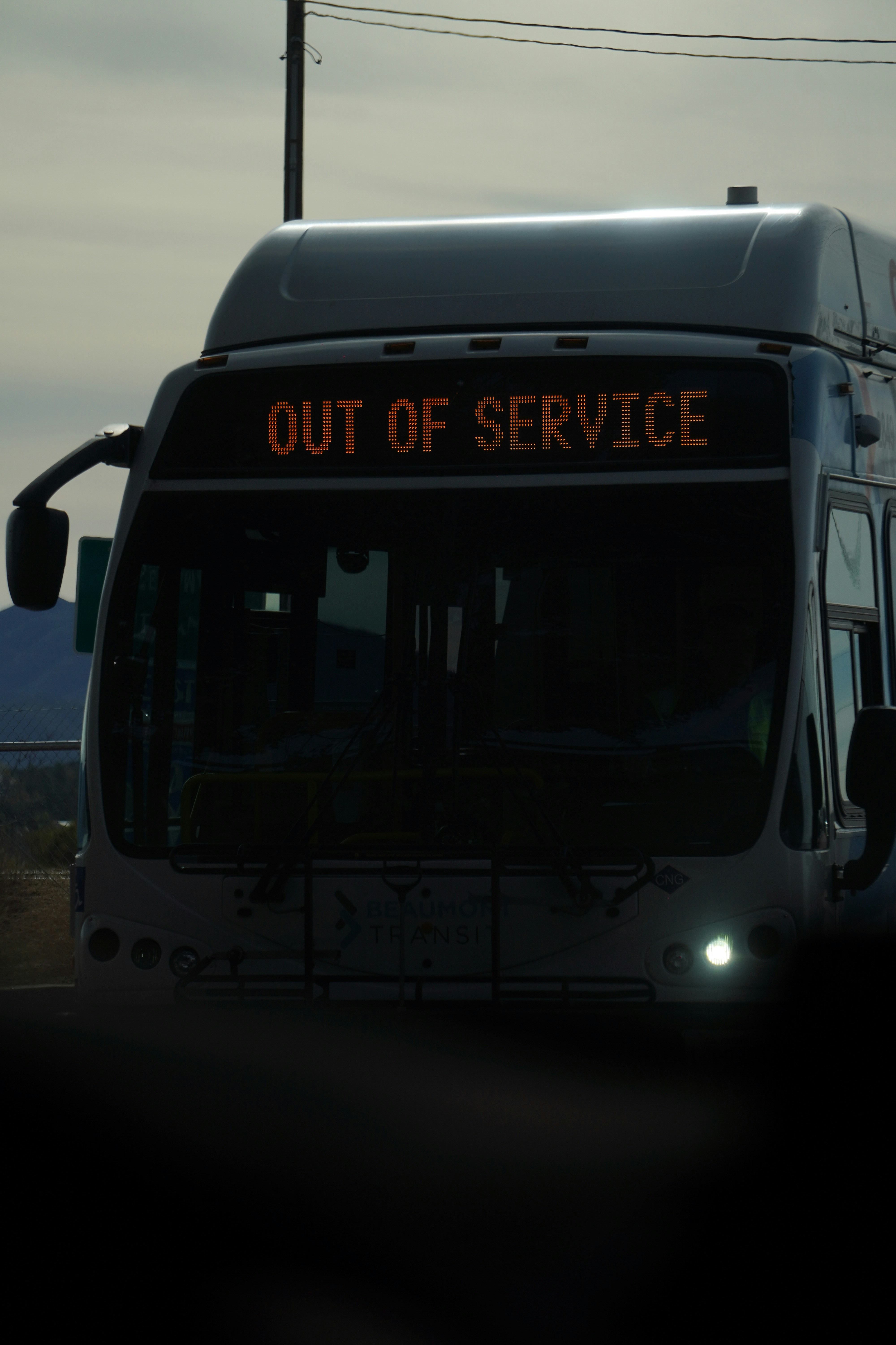 A bus displays "out of service" on its sign.