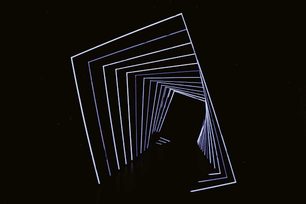 Abstract geometric tunnel with white lines on black