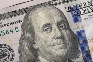 Close-up of a united states one hundred dollar bill.