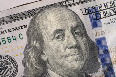 Close-up of a united states one hundred dollar bill.