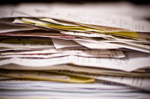 A close-up of a stack of papers.