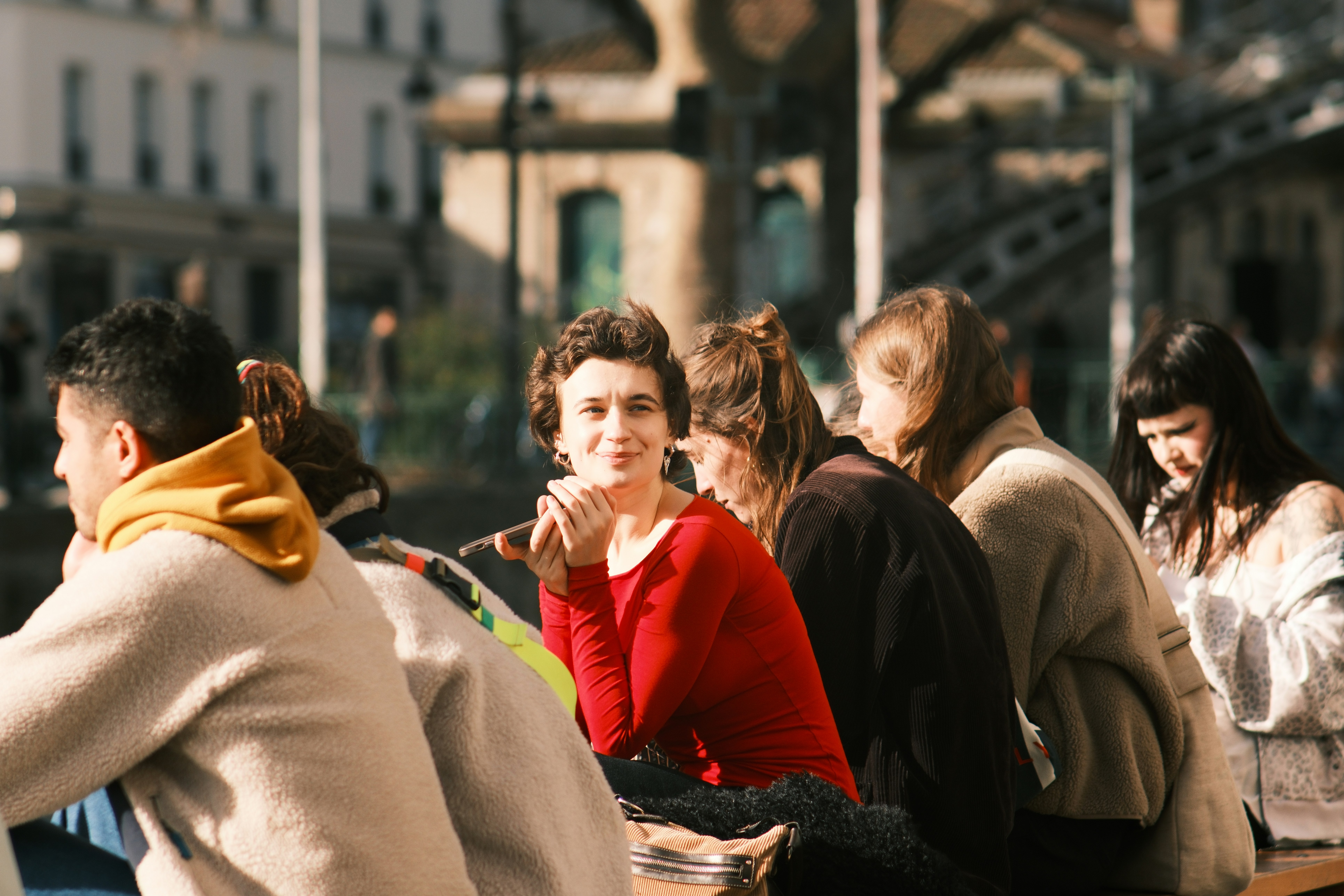 A vibrant photo of a queue of women voters at a polling booth in West Bengal.
