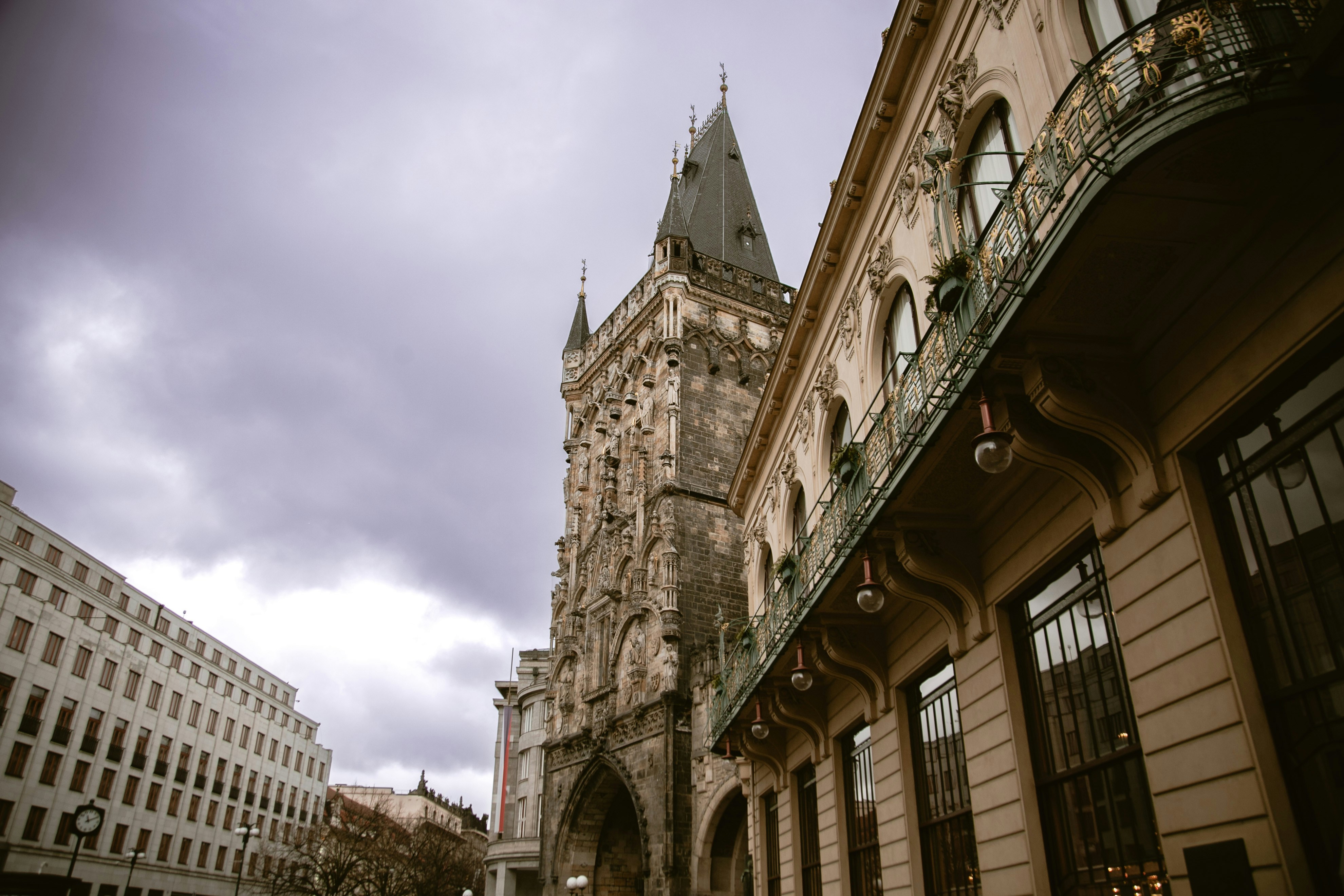 Old stone tower against a dramatic cloudy sky.