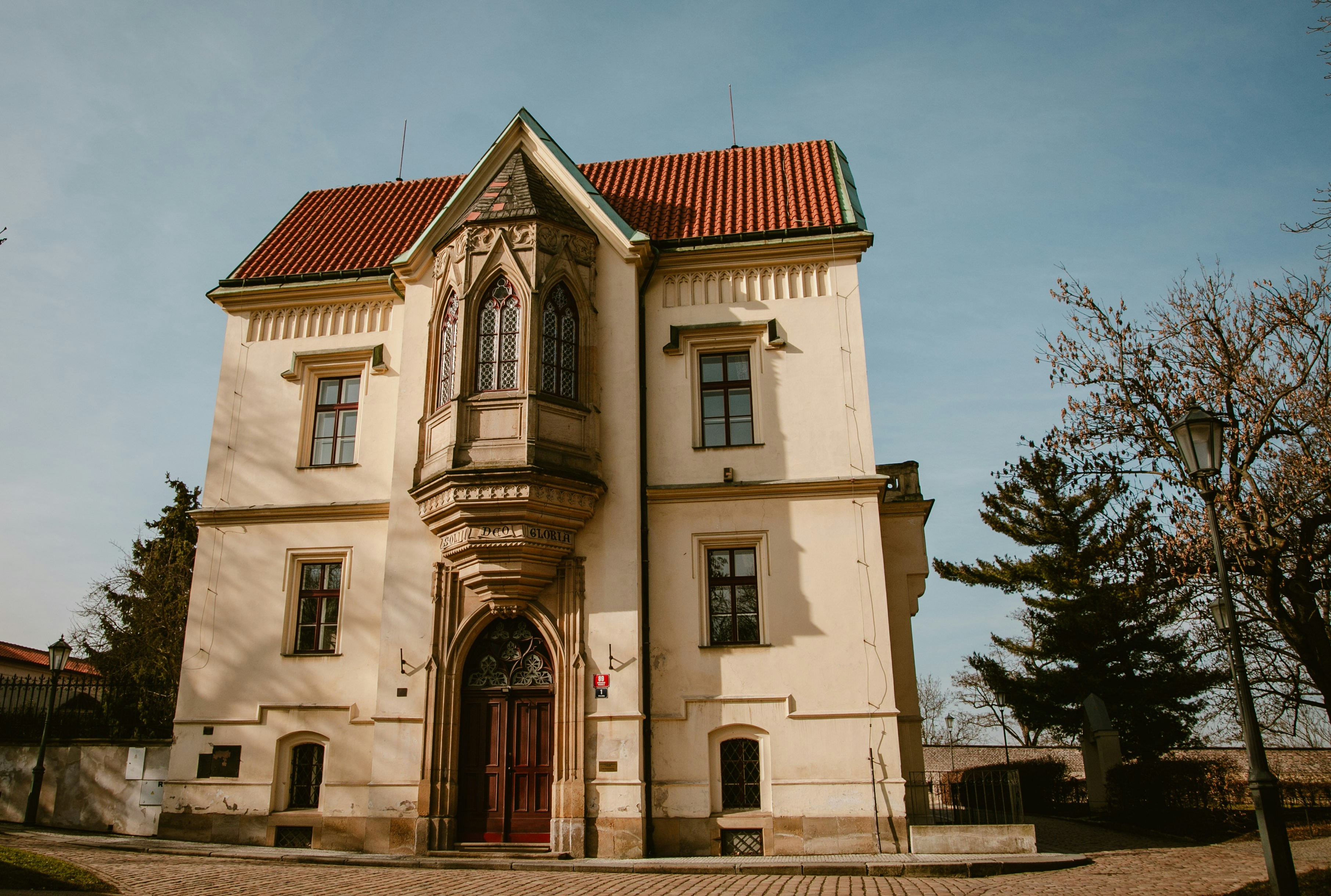 A historic building with a red tiled roof.