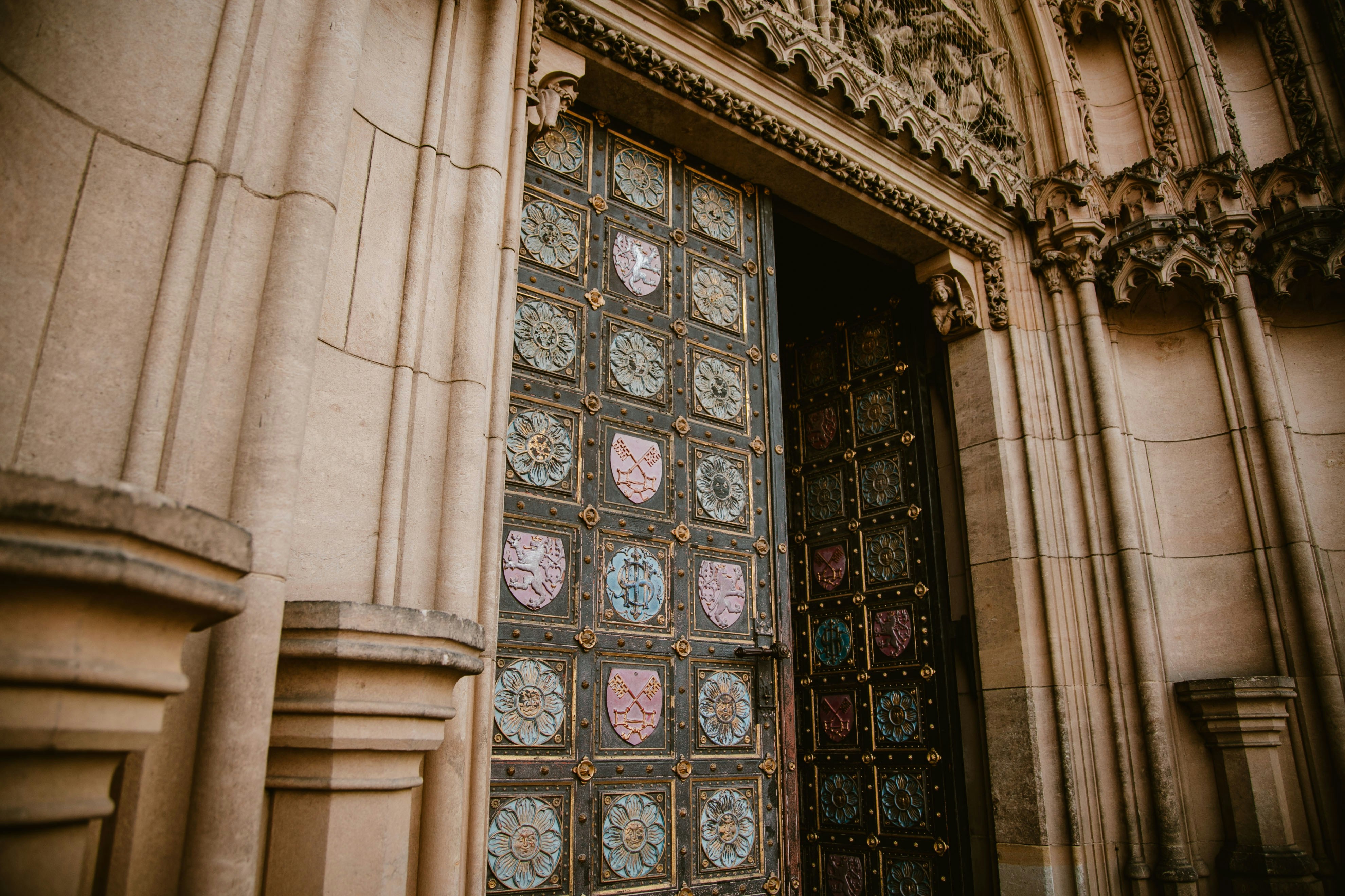 Ornate doors of a grand stone building