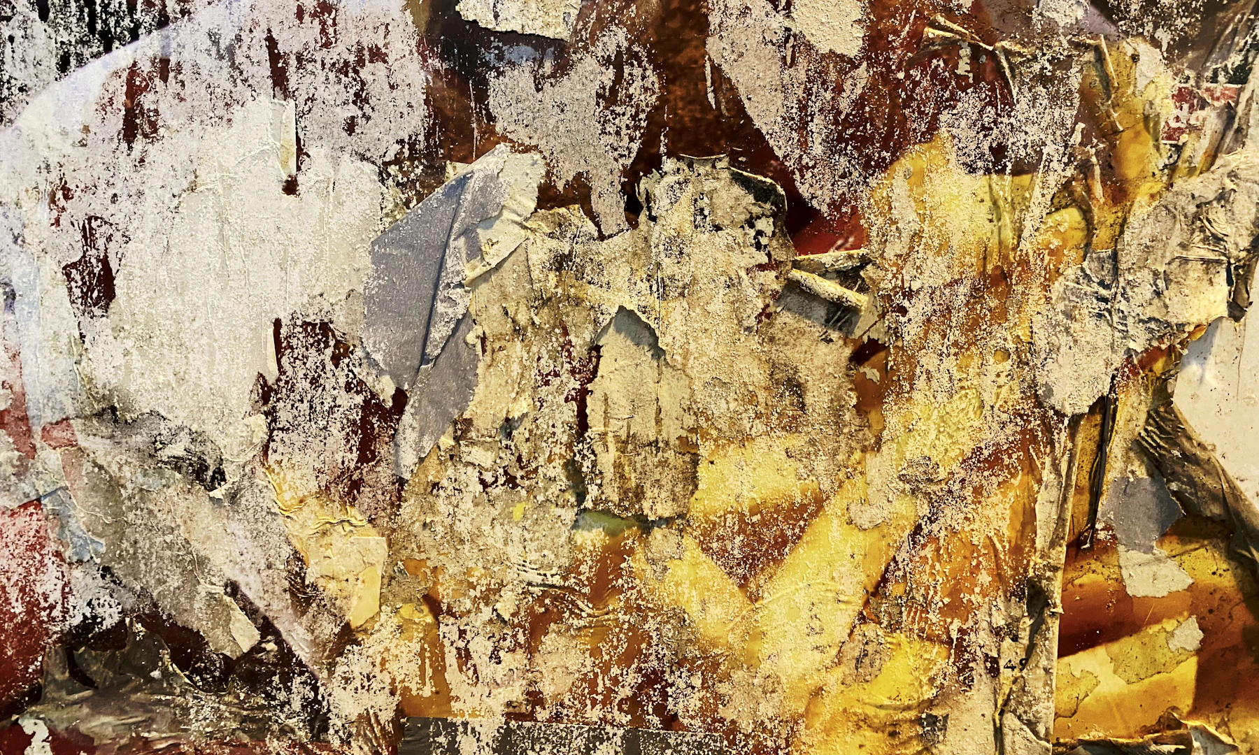 Torn paper texture forming an abstract layered surface