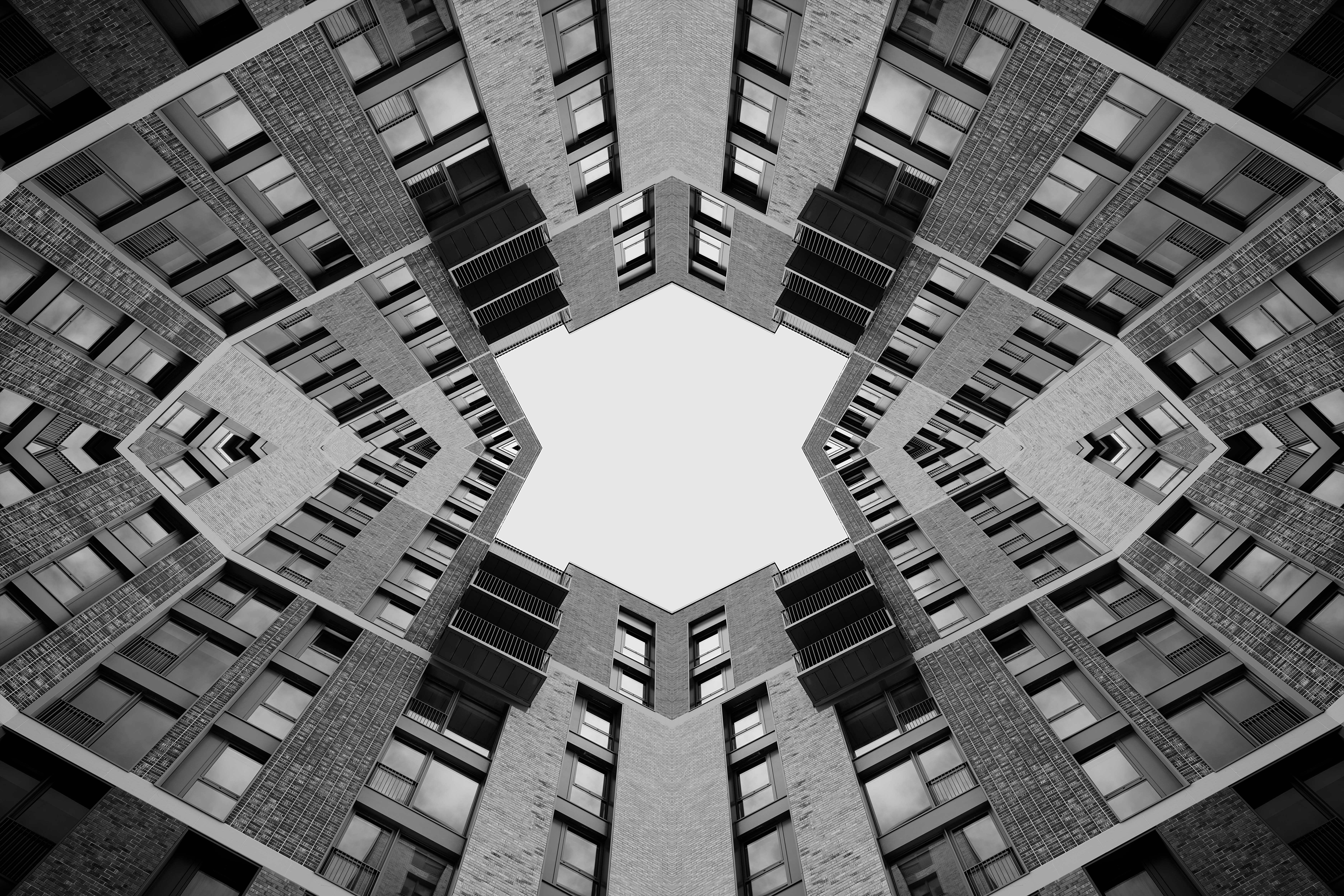 Symmetrical view of modern buildings from below