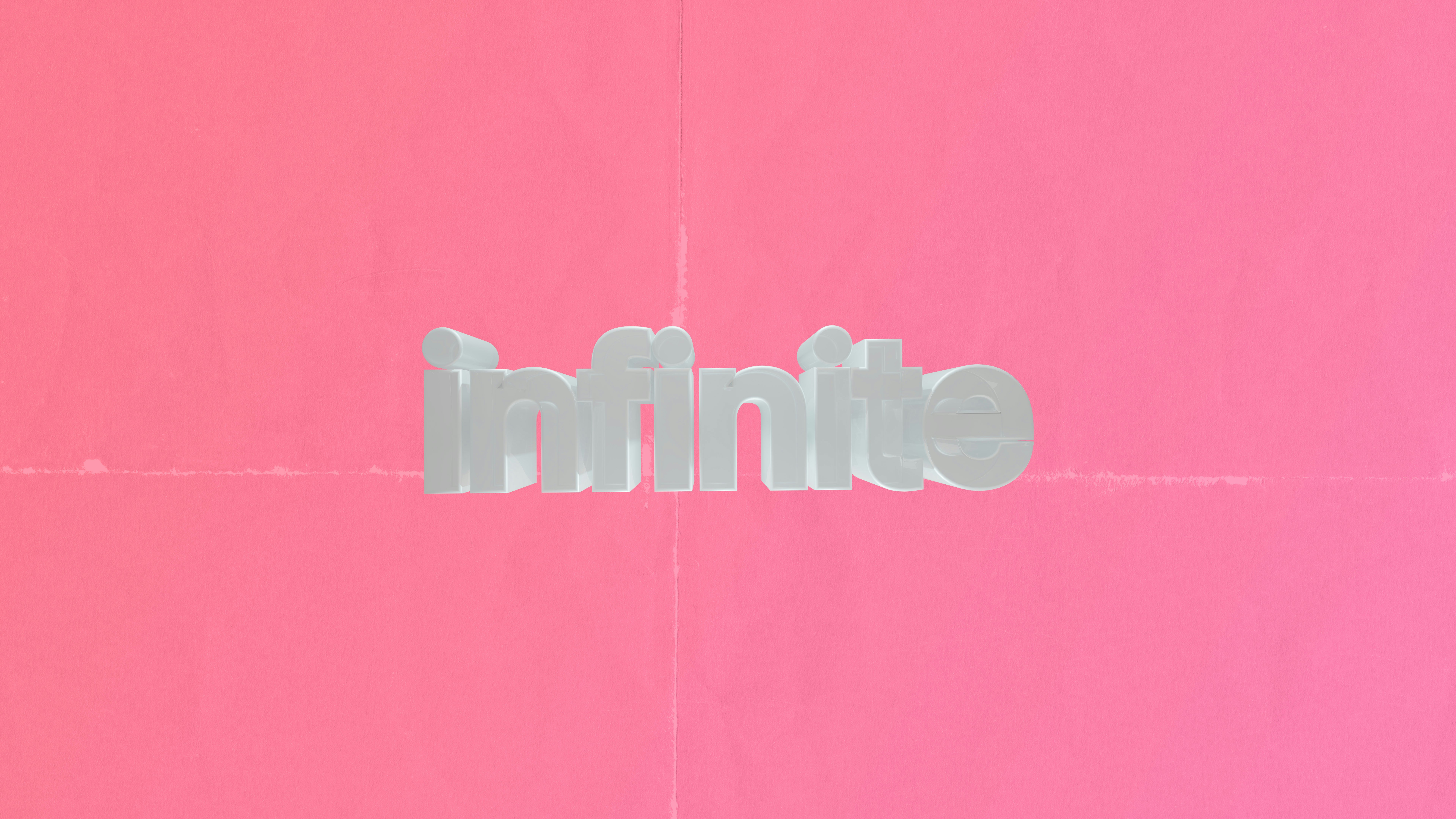 Le mot infini en texte 3D sur fond rose