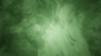 Green smoke swirling with a bright center