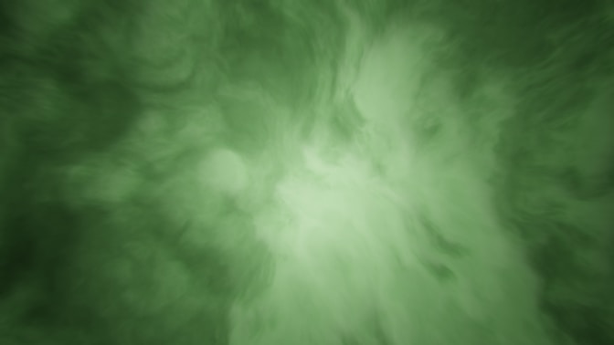 Green smoke swirling with a bright center