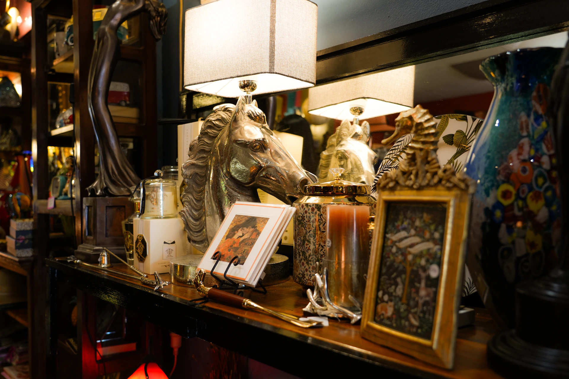 Collection of decorative items on a shelf.