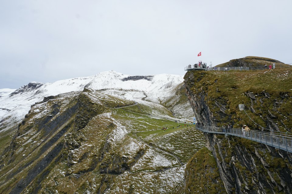 Visitors on the First Cliff Walk suspension bridge above Grindelwald