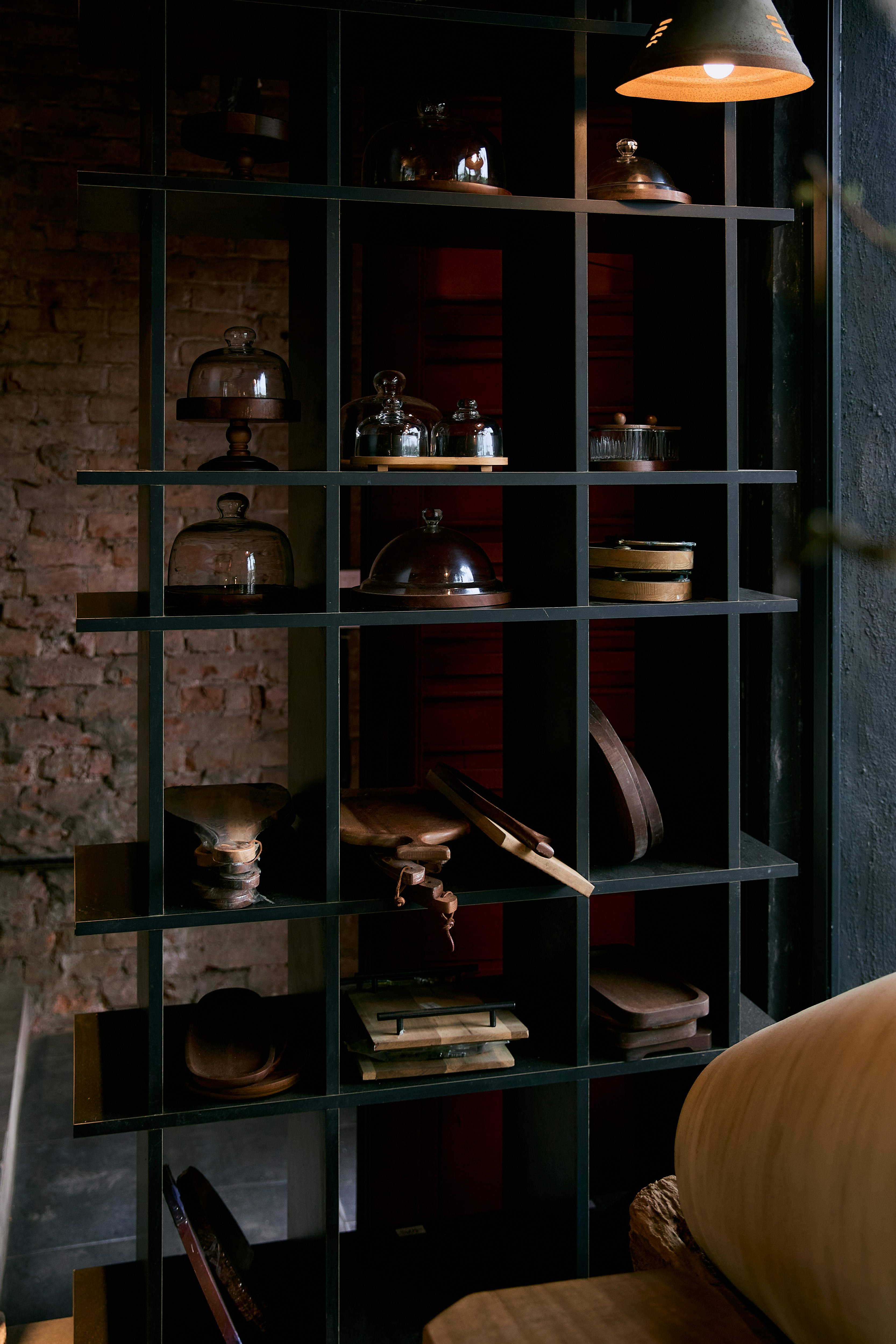 Display shelf with various antique kitchen items