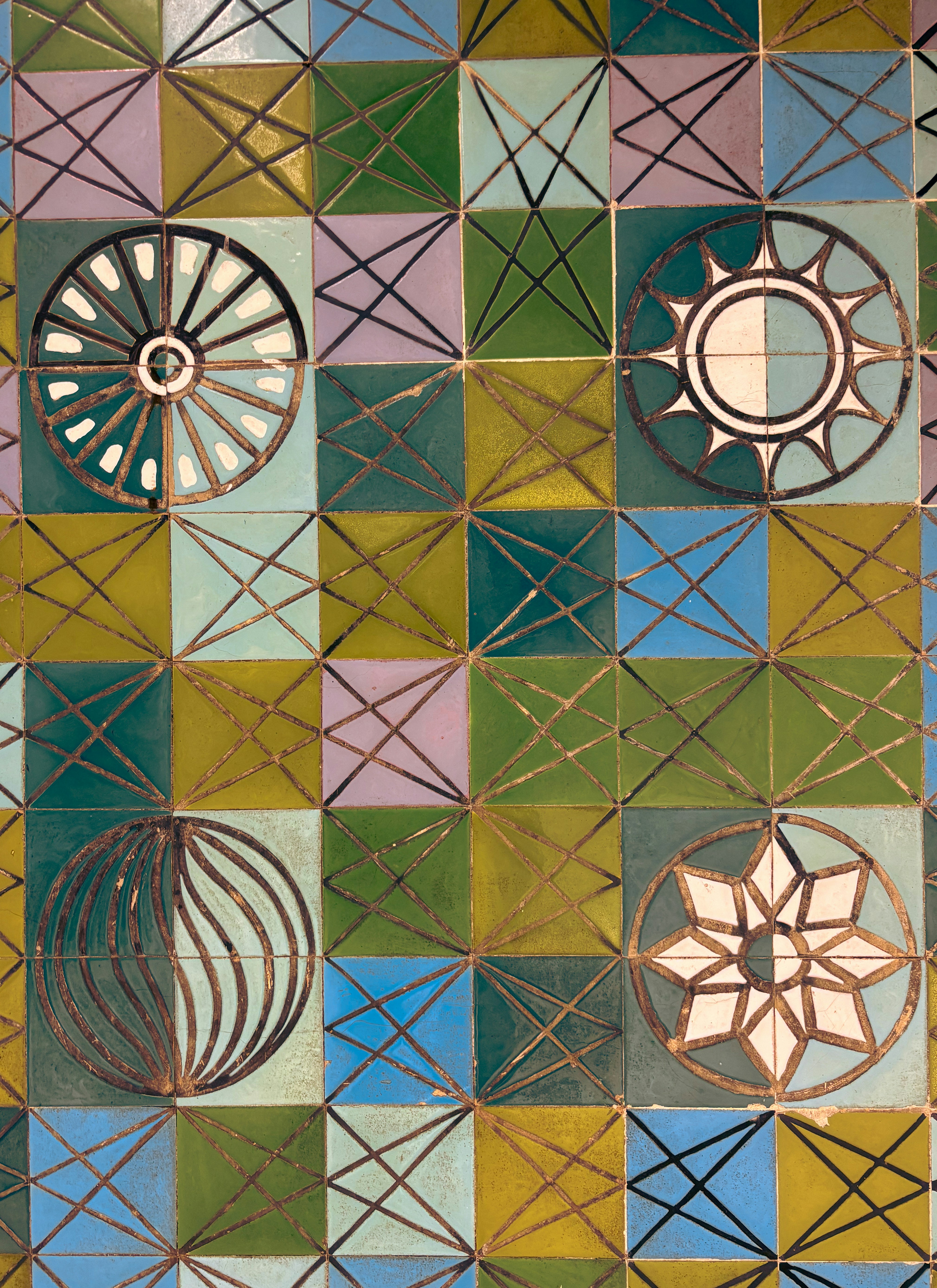 Colorful geometric tile pattern with abstract circular designs