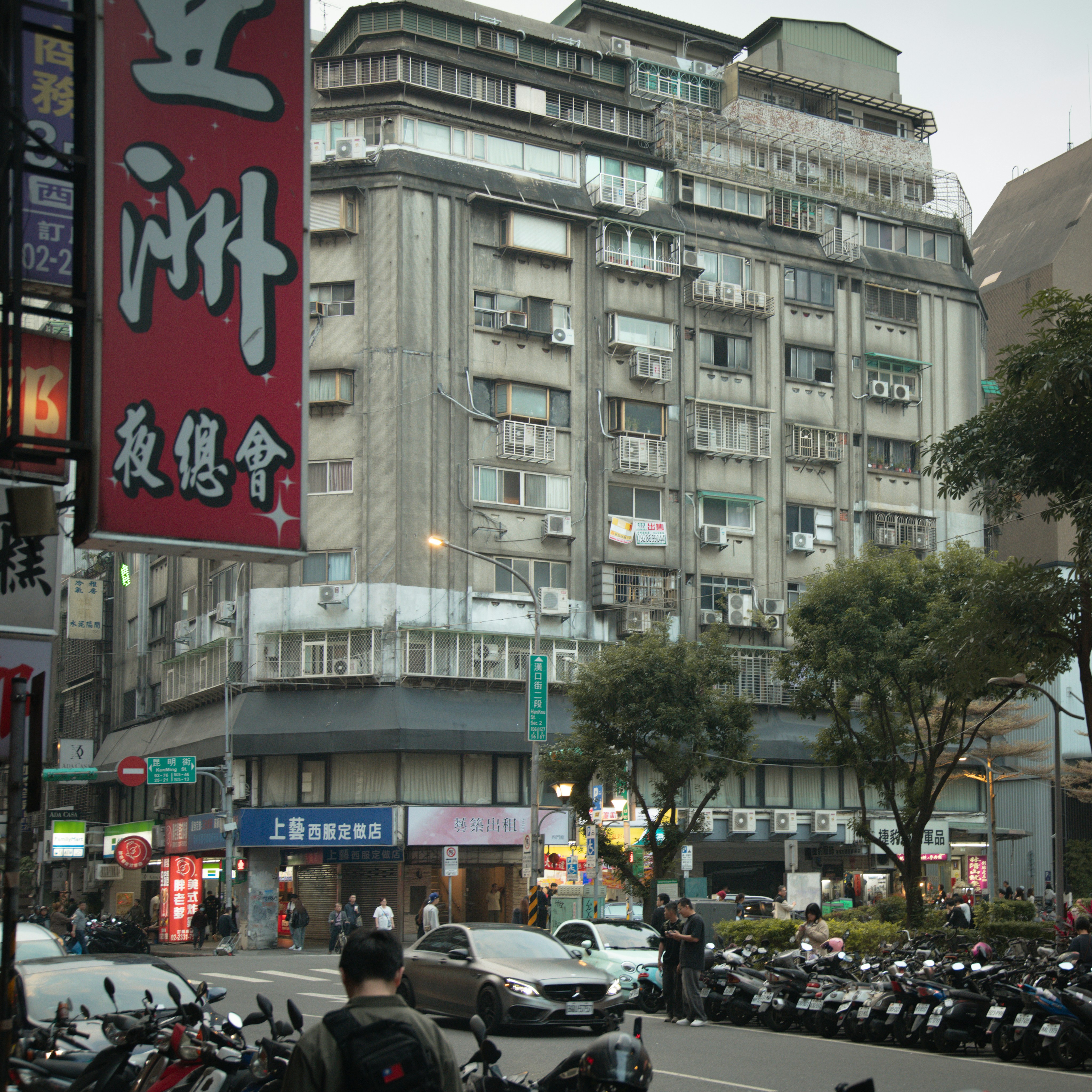 City street with old buildings and parked motorcycles