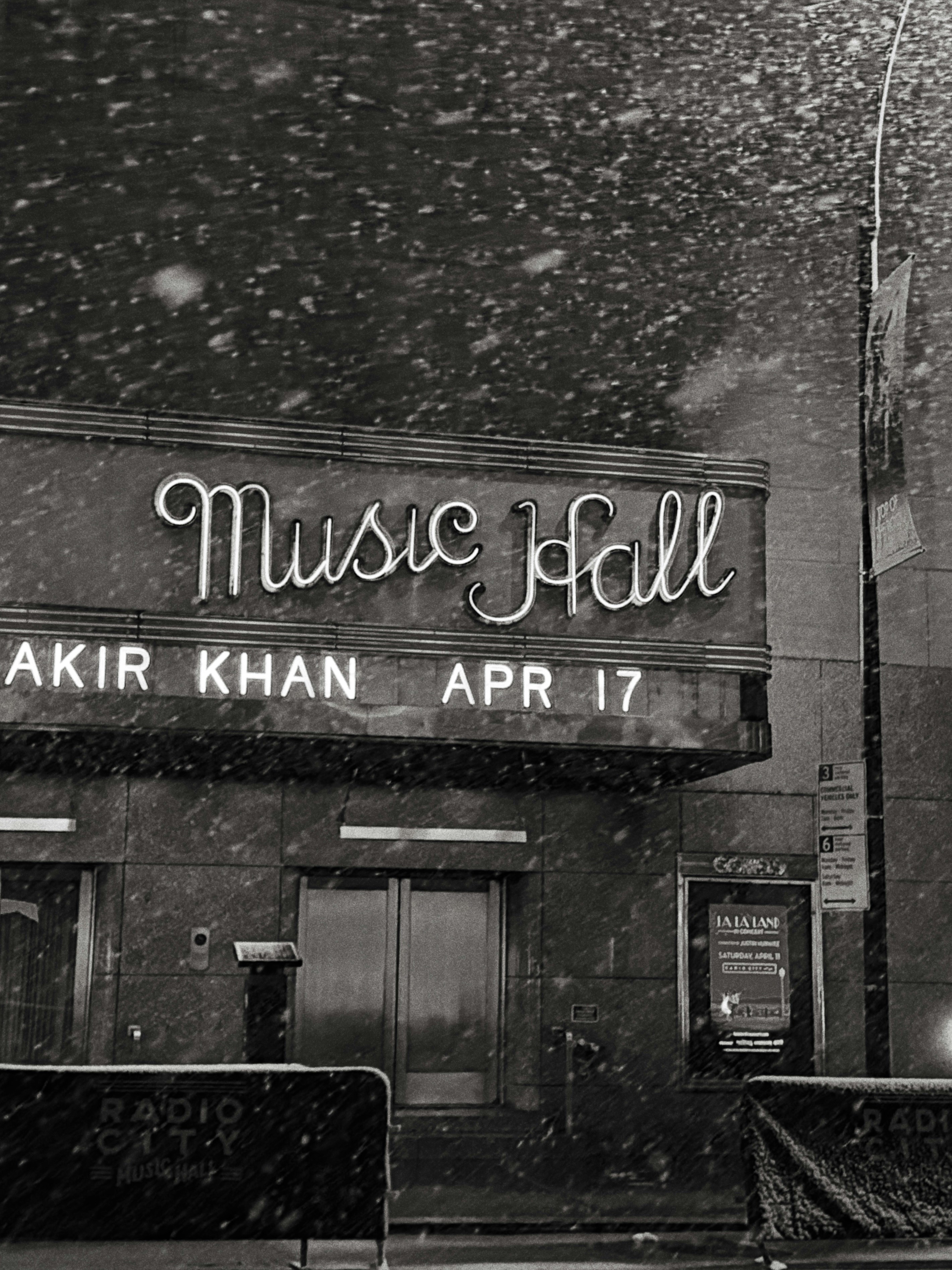 Music hall entrance with falling snow