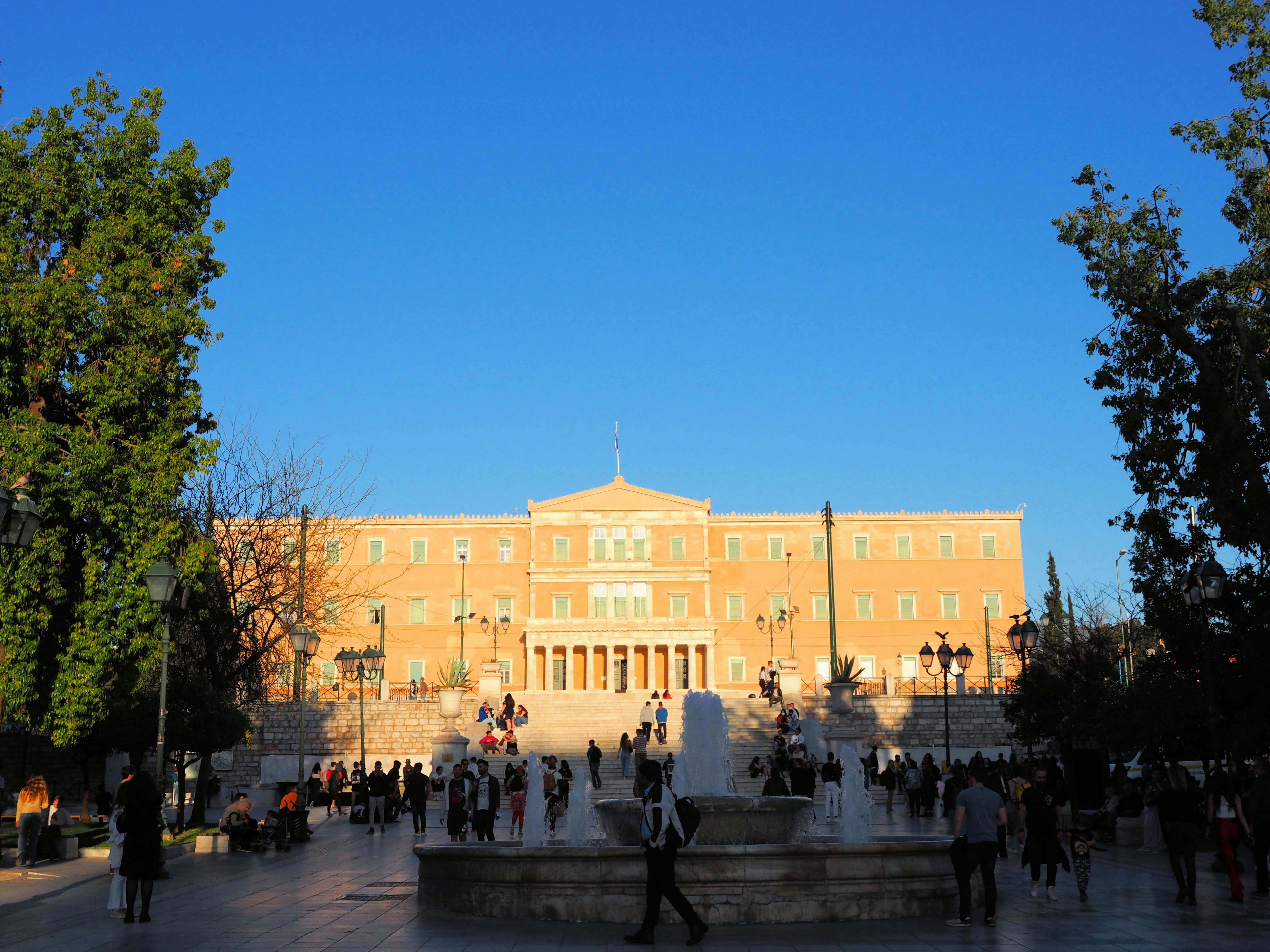 A large building with columns and a wide staircase.