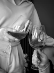 Two glasses clinking, one with "hello 40" written on it.
