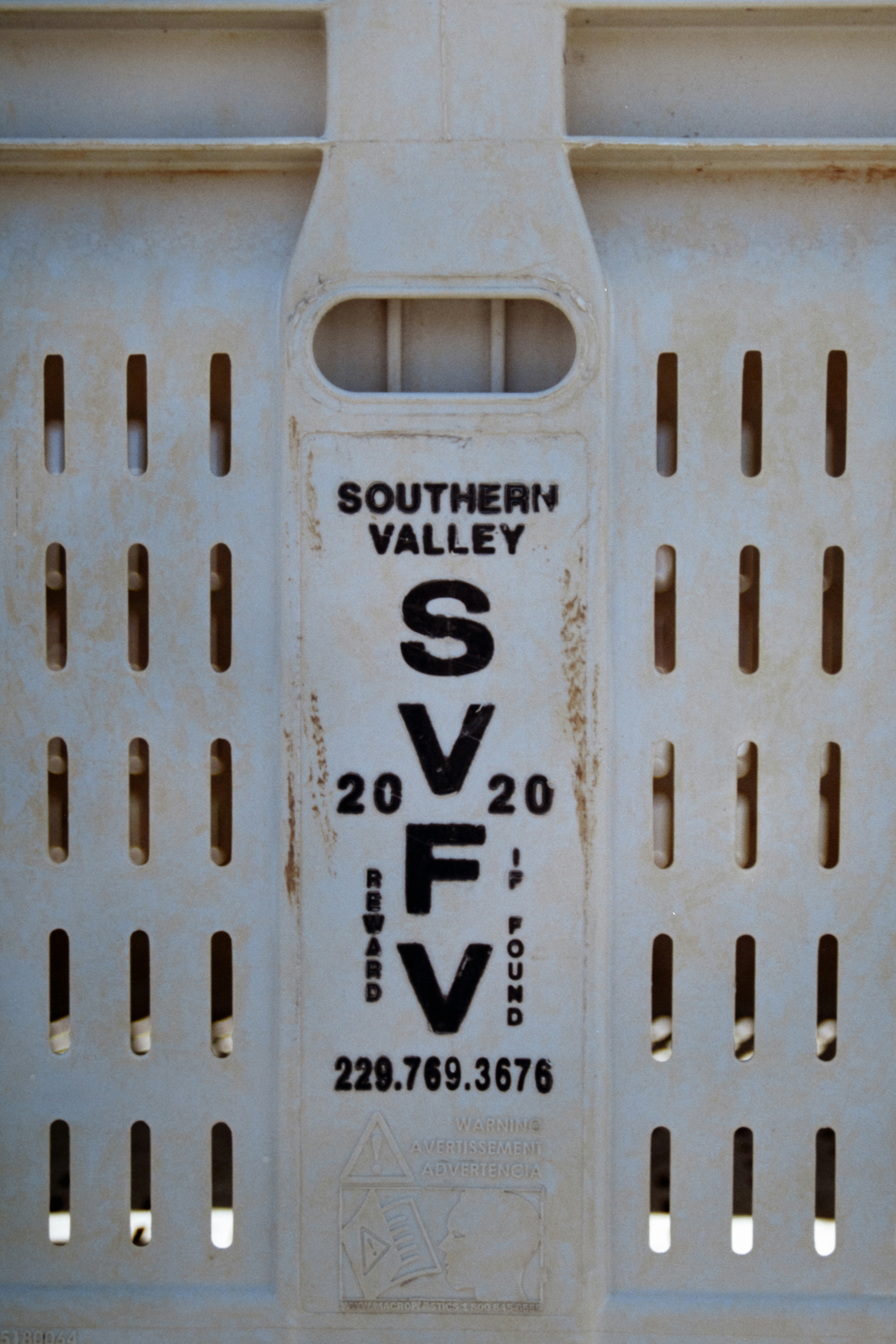White crate with southern valley svf logo